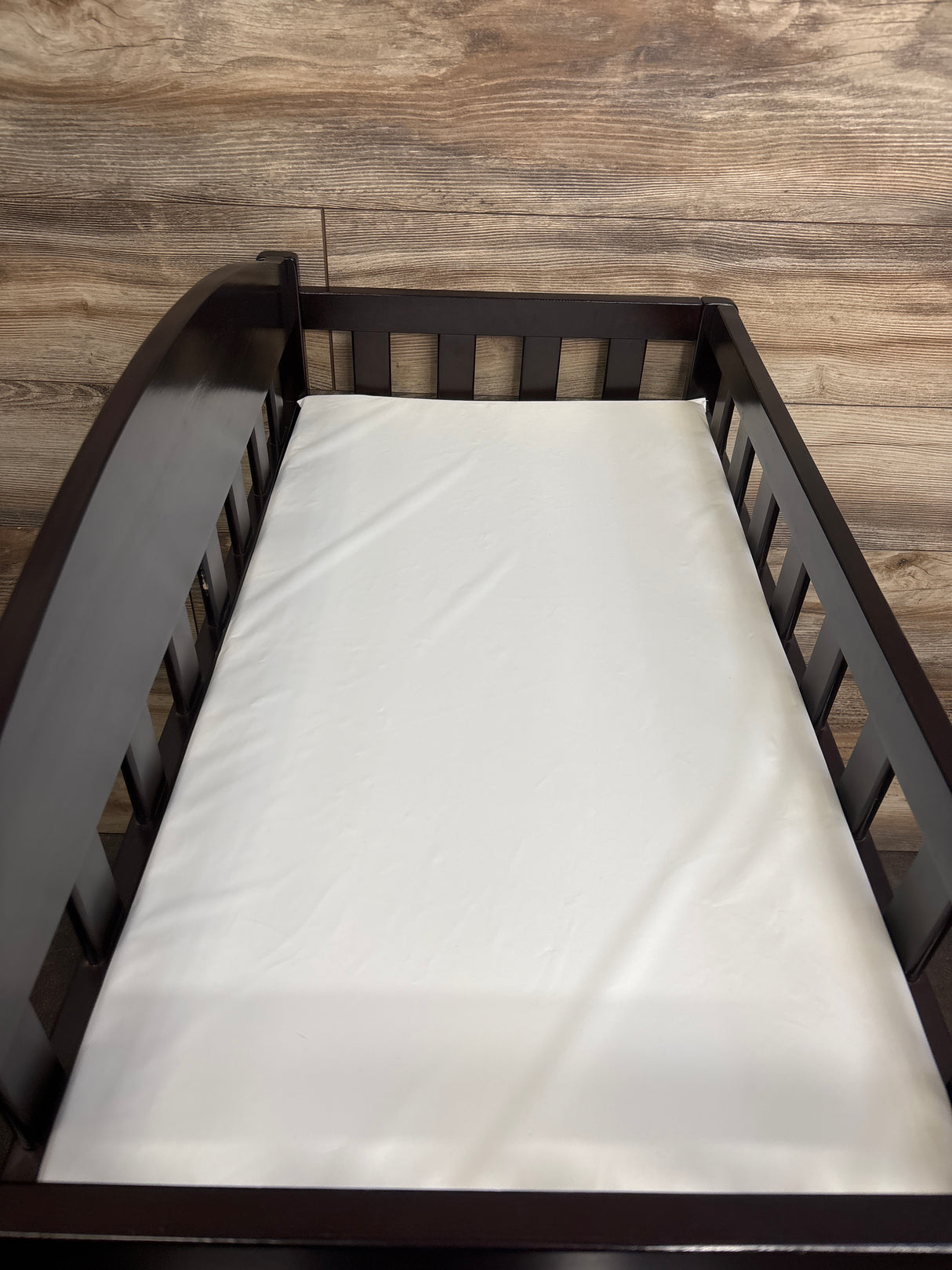 Delta Children Wilmington Changing Table with Pad in Dark Chocolate