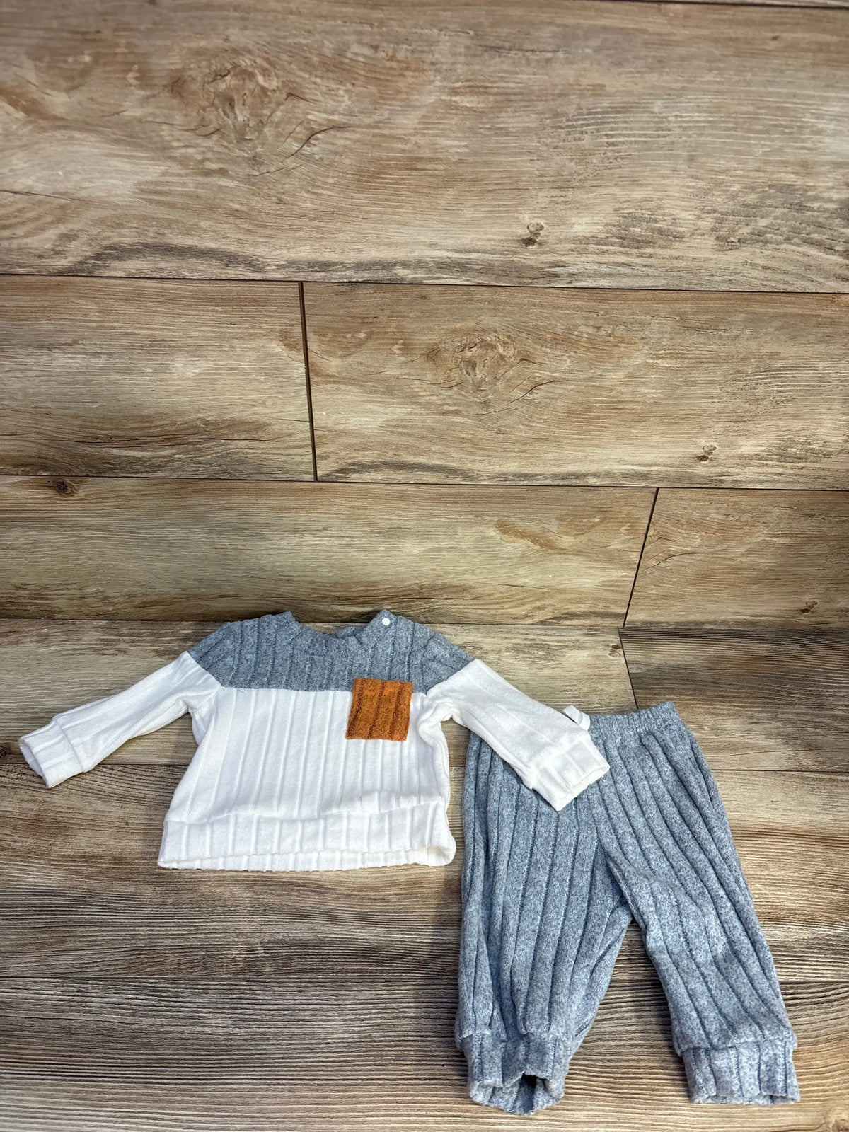 Front view of Shein two-piece shirt and pants set with long sleeves, chest pocket, and ribbed gray pants on wood floor