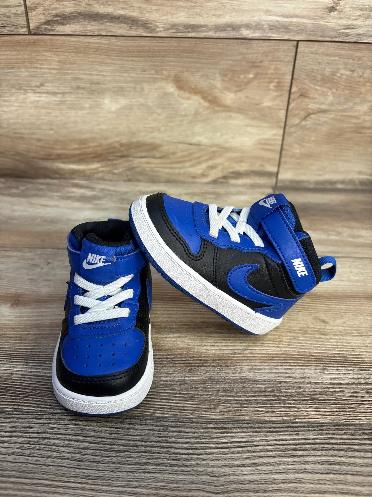 Nike Court Borough Mid 2 Recraft TD Game Royal Black toddler sneakers on a wood background