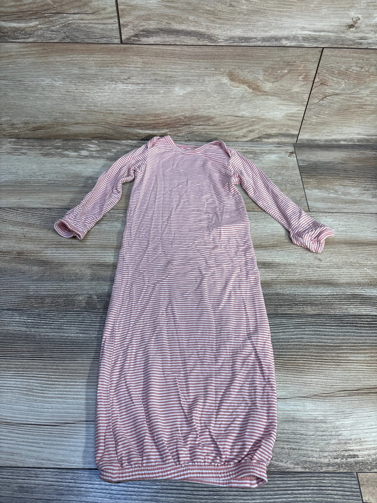 Front view of Carter’s PurelySoft pink striped sleep gown showcasing long sleeves and fold-over cuffs on wood-look floor