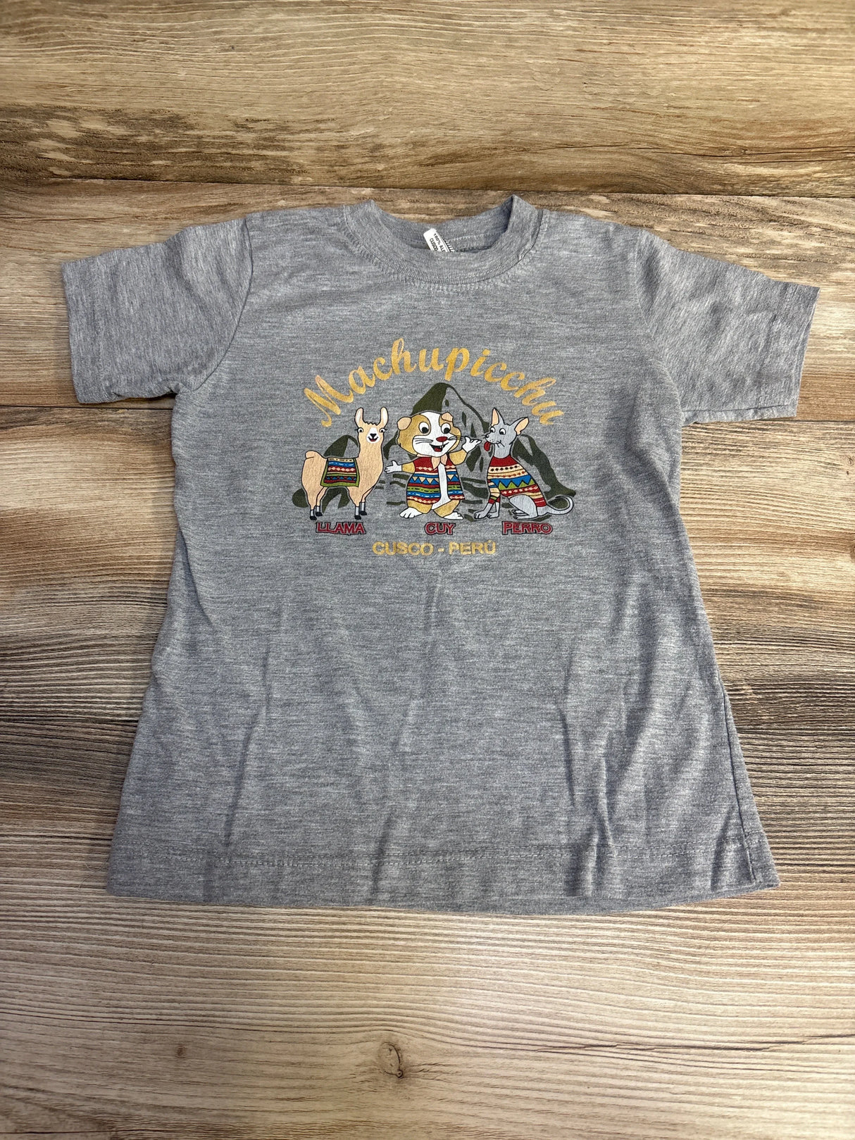 Front view of grey toddler 4T shirt showcasing llama Machu Picchu graphic on white background