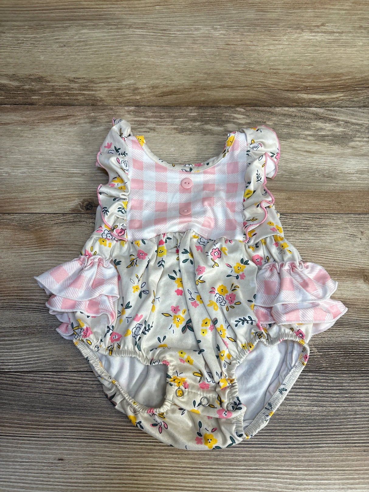 Pink gingham and floral baby romper with ruffles, perfect for infant girls' summer outfits