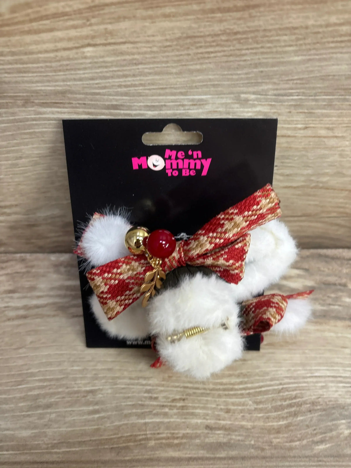 Festive red and gold bow hair clips with white pom poms for baby girls, holiday outfit accessory