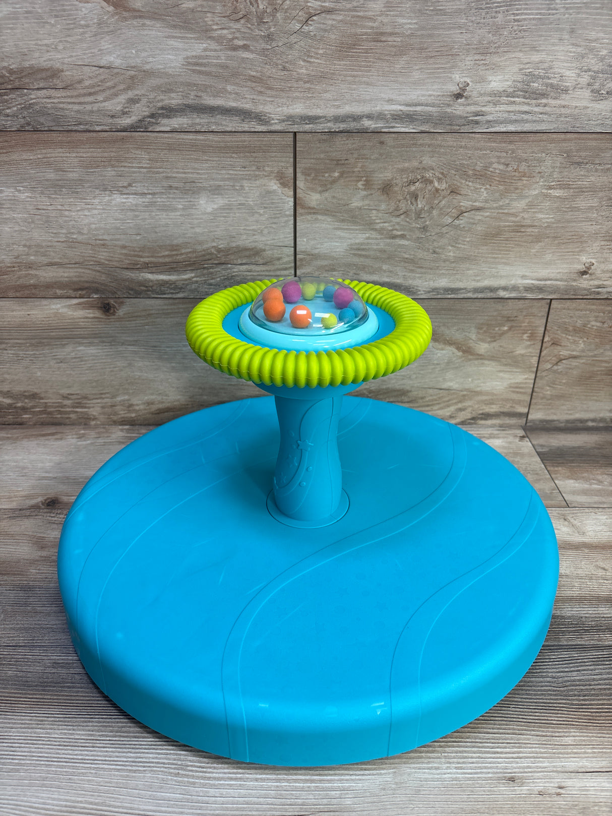 B. Toys Twirly Time Spinning Activity Toy