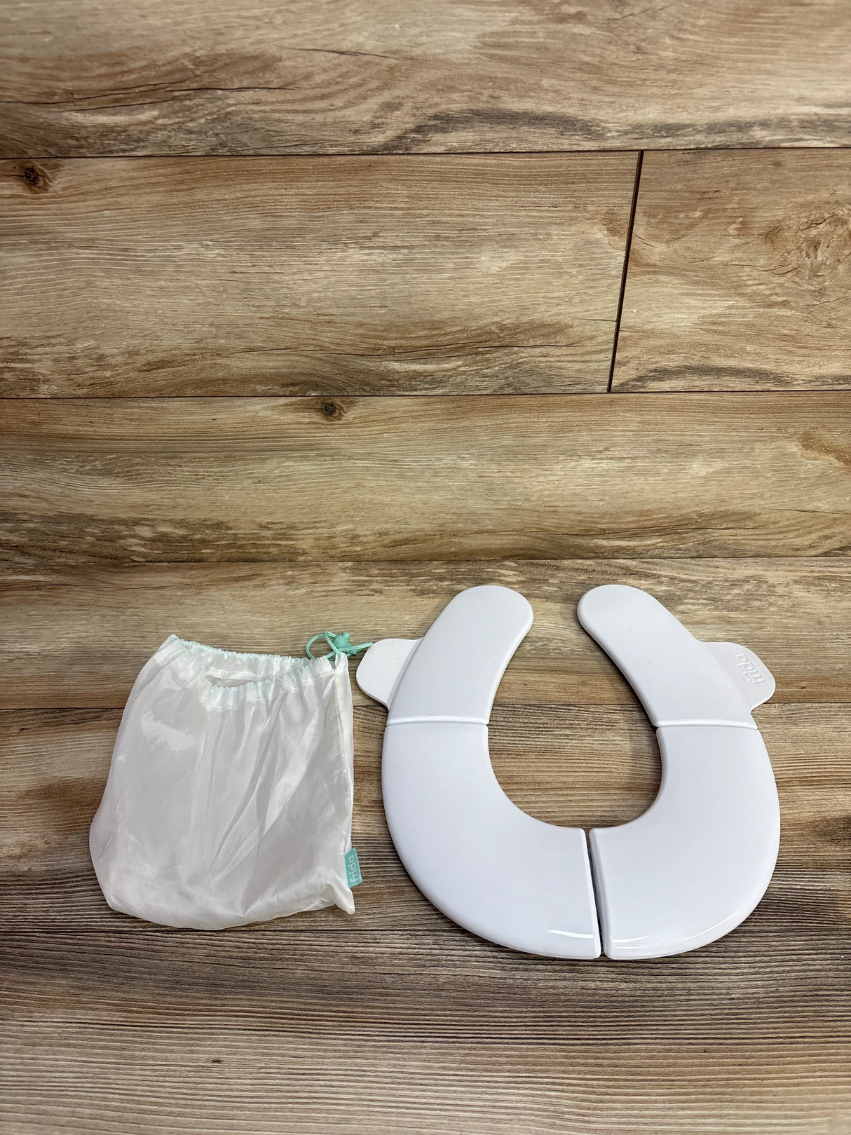 Frida Baby Fold-And-Go Potty Seat - White