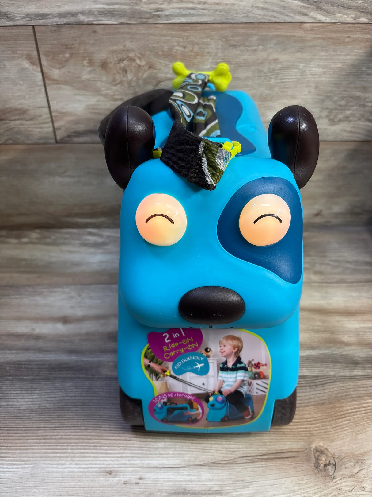 B. toys On The Go Woofer Ride-On Suitcase