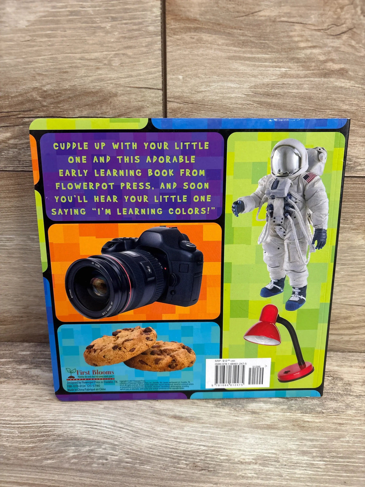 Back cover of I’m Learning Colors board book with I’m Learning Colors headline, astronaut, camera, cookies, and red lamp
