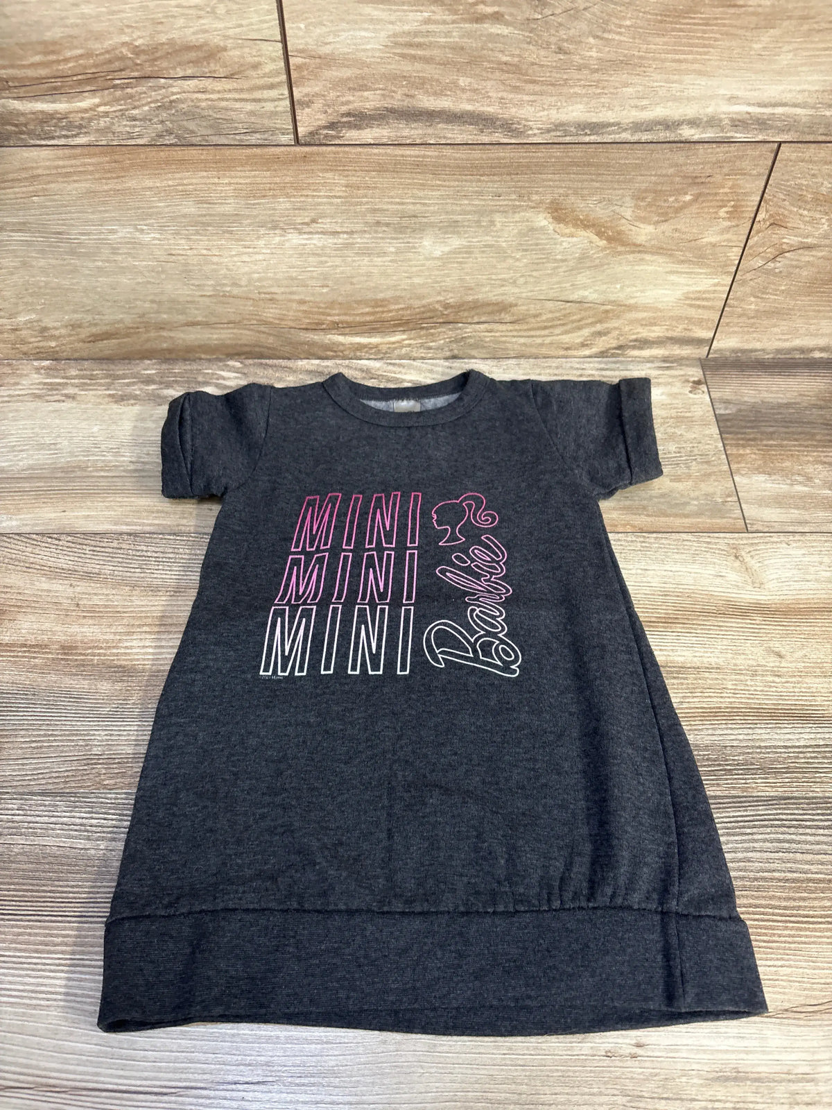Grey short sleeve sweatshirt dress for toddlers with pink and white Mini Barbie graphic print