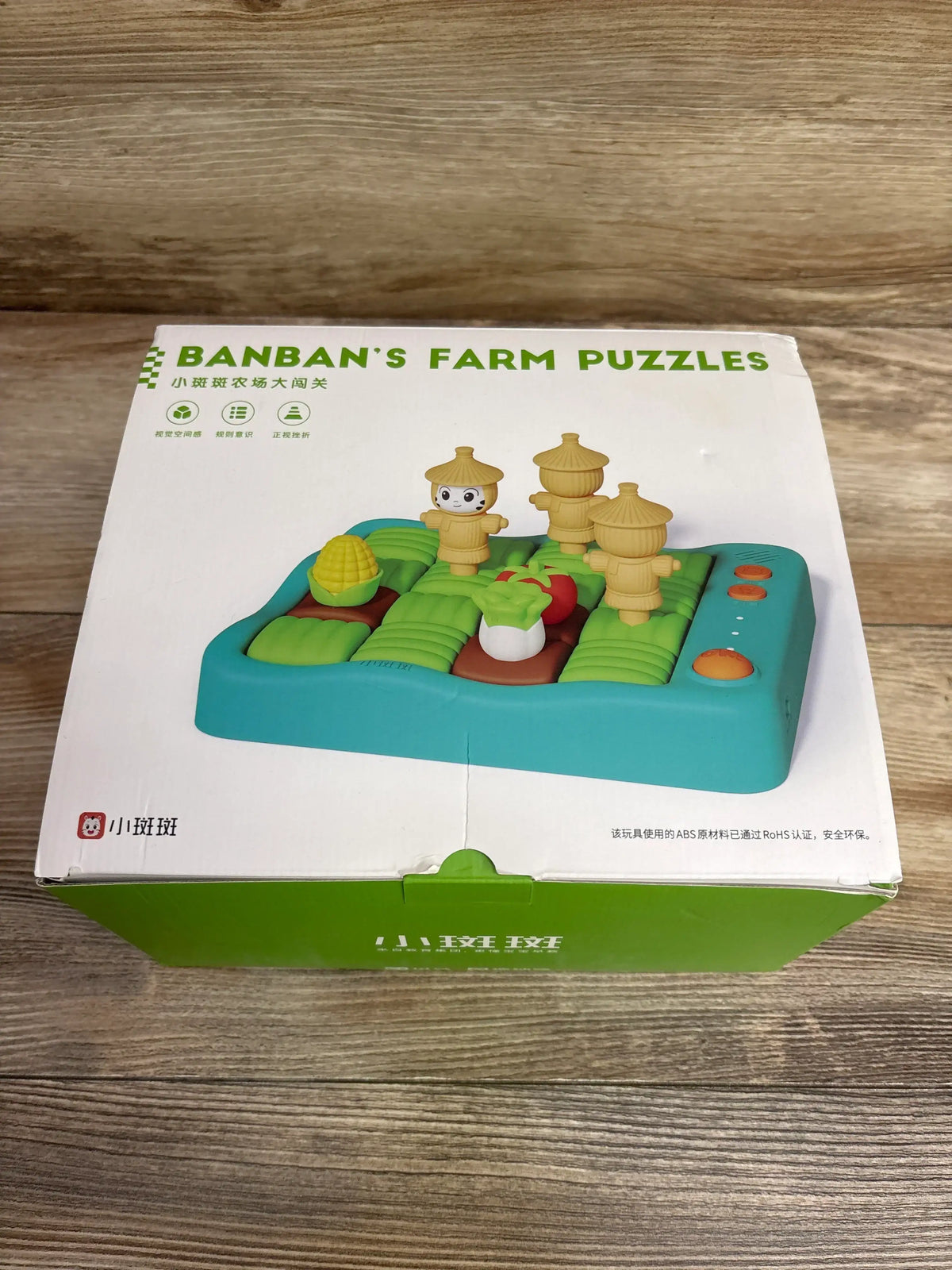 Banban's Farm Puzzles kids educational toy with colorful farm-themed pieces on blue base in green box