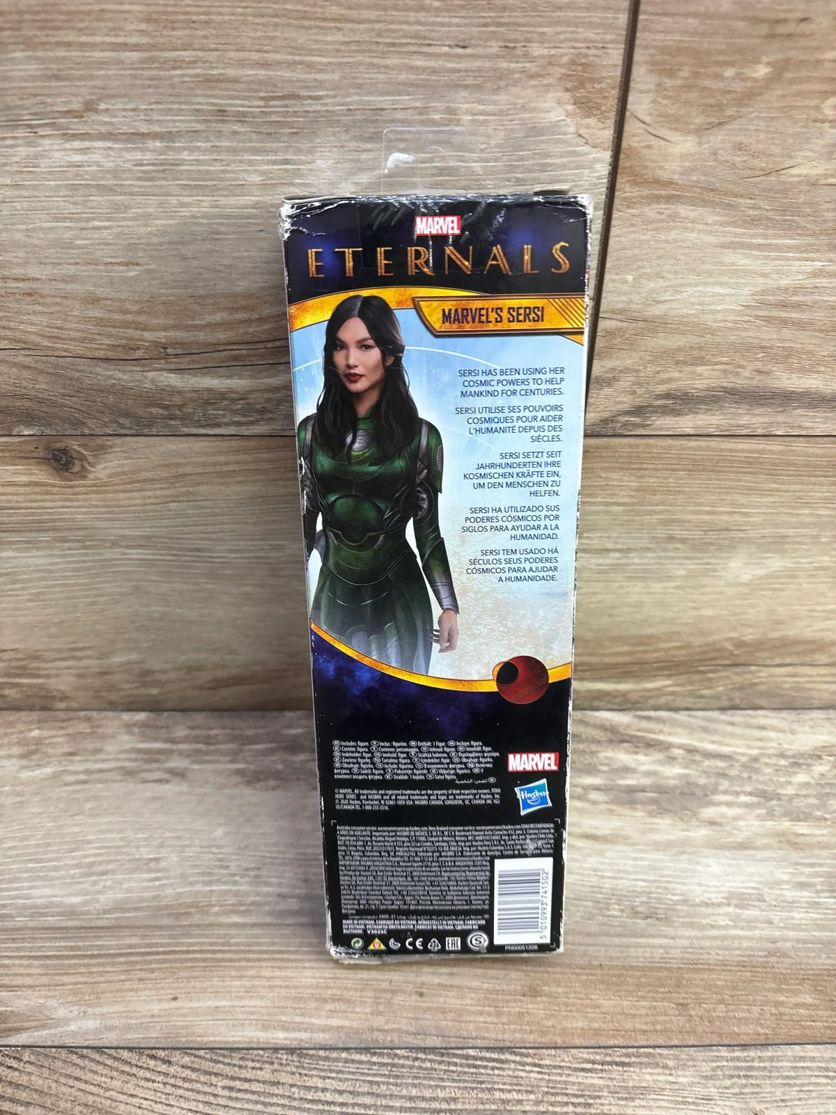 Marvel Eternals Sersi action figure box on wood background, kids toy packaging
