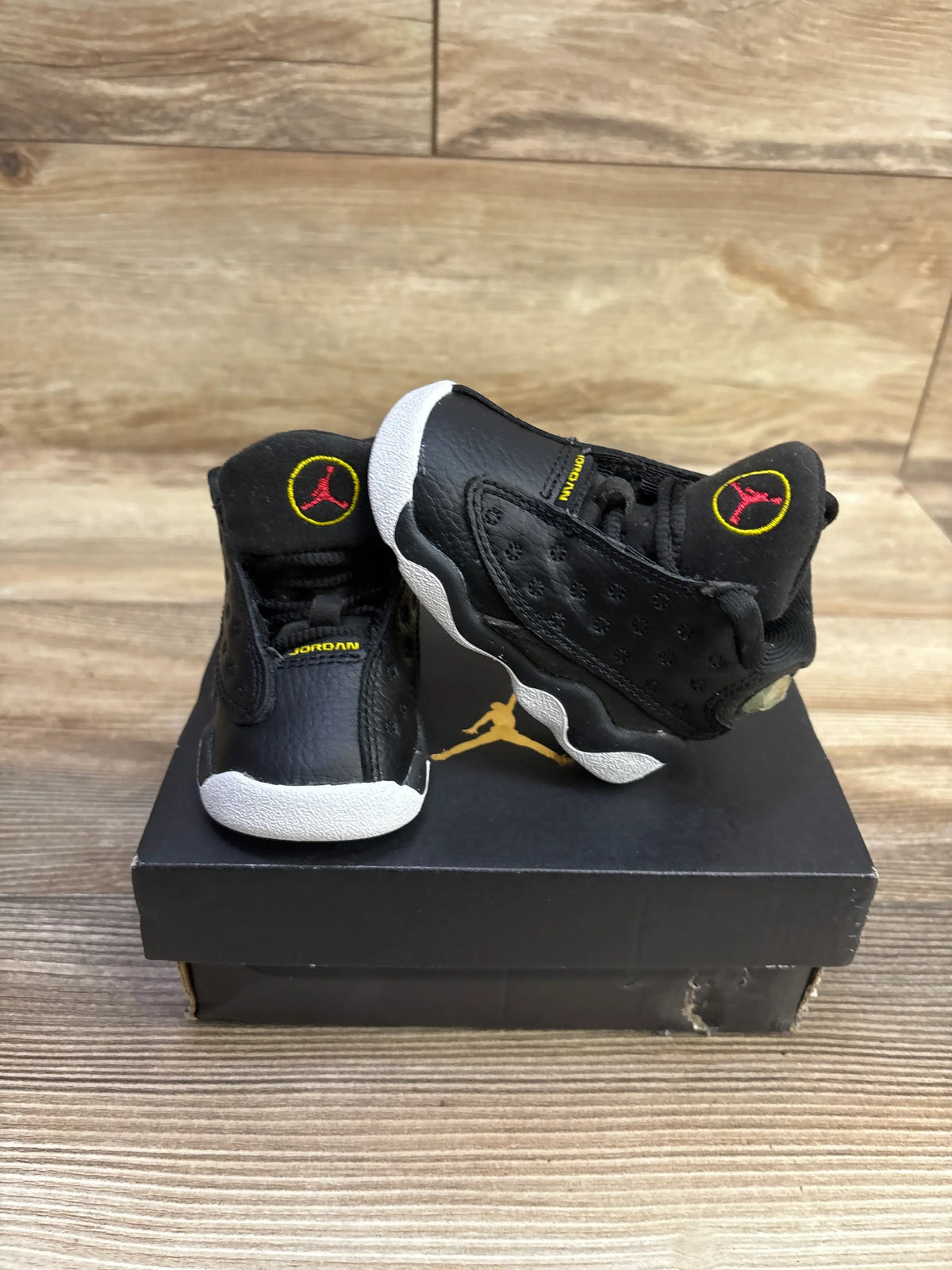 Front and side view of Air Jordan 13 Retro TD Playoff sneakers, size 3C, with black uppers, white soles, and Jumpman logos