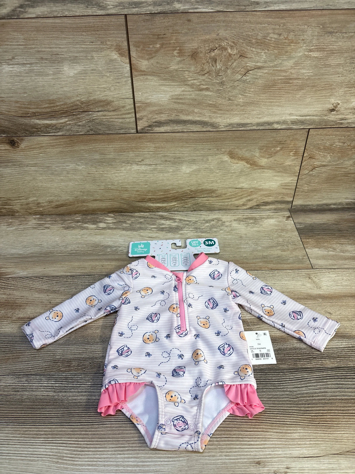 Disney Baby Winnie the Pooh long-sleeve rash guard swimsuit, size 3M, UPF 50+, pink ruffle trim, for infant sun protection.