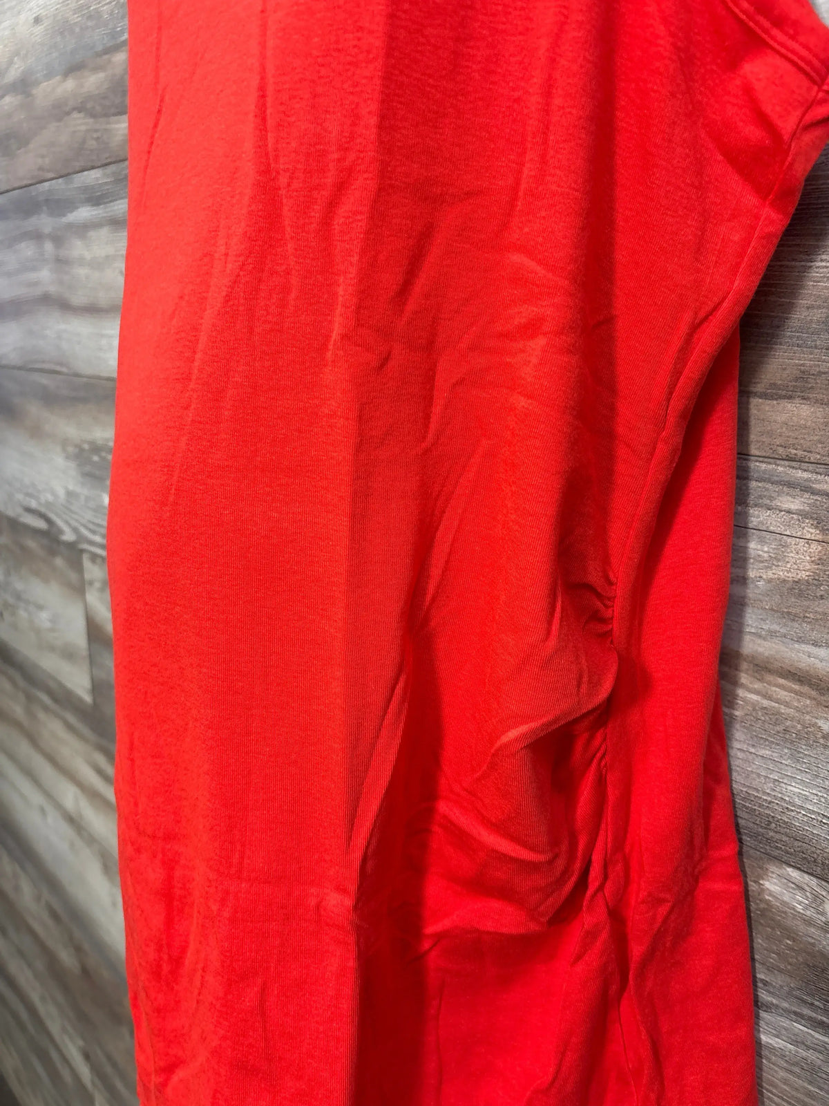 Close-up view of the red Gap Maternity Modern Tank Top showcasing its soft modal knit fabric on a wood background