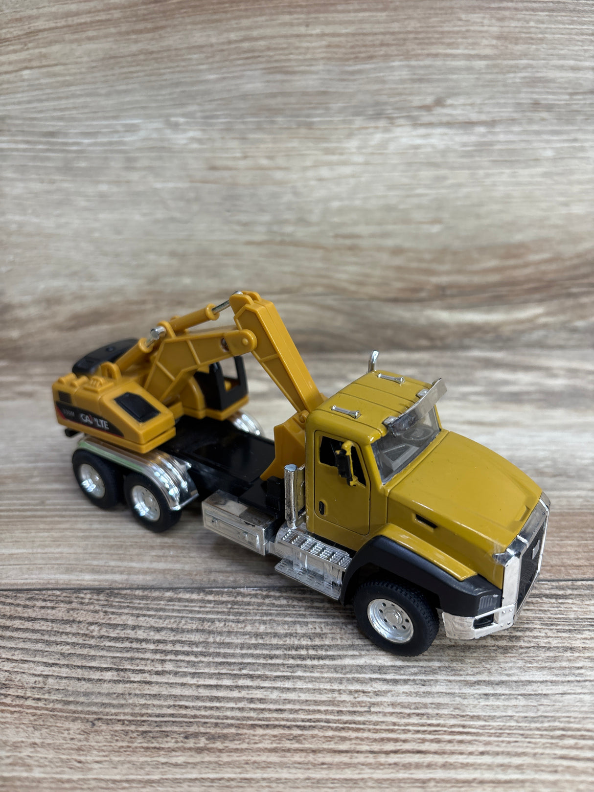 Pull-Back Excavator Truck