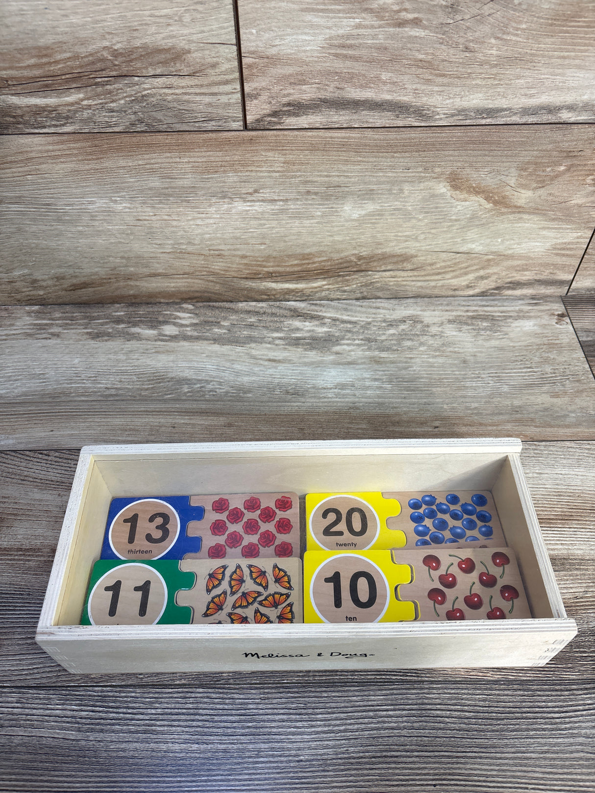 Melissa & Doug Self-Correcting Wooden Number Puzzles With Storage Box