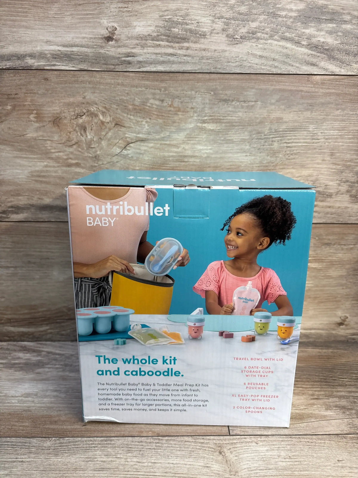 Front view of NutriBullet Baby and Toddler Meal Prep Accessory Kit box showing accessories and The whole kit and caboodle