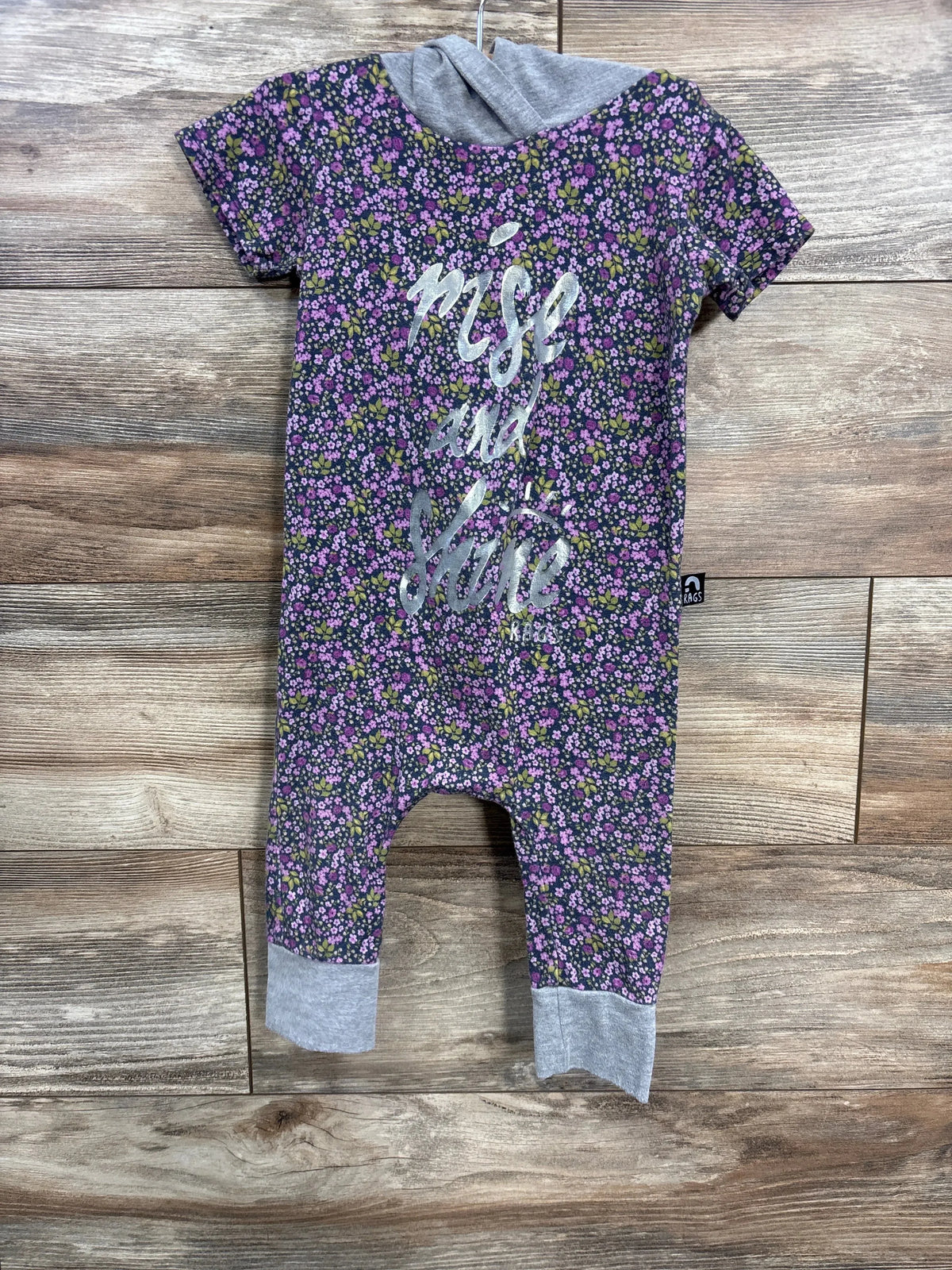 Front of Rags hooded romper (18-24m) purple floral with grey hood and cuffs and silver script nice and cute on wood