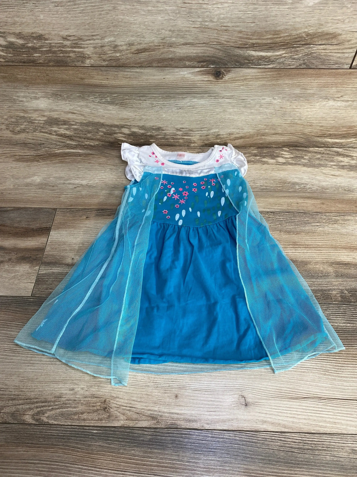 Front view of Floral Dress White/Blue sz 2T, 100% cotton, with floral bodice and sheer blue overlay