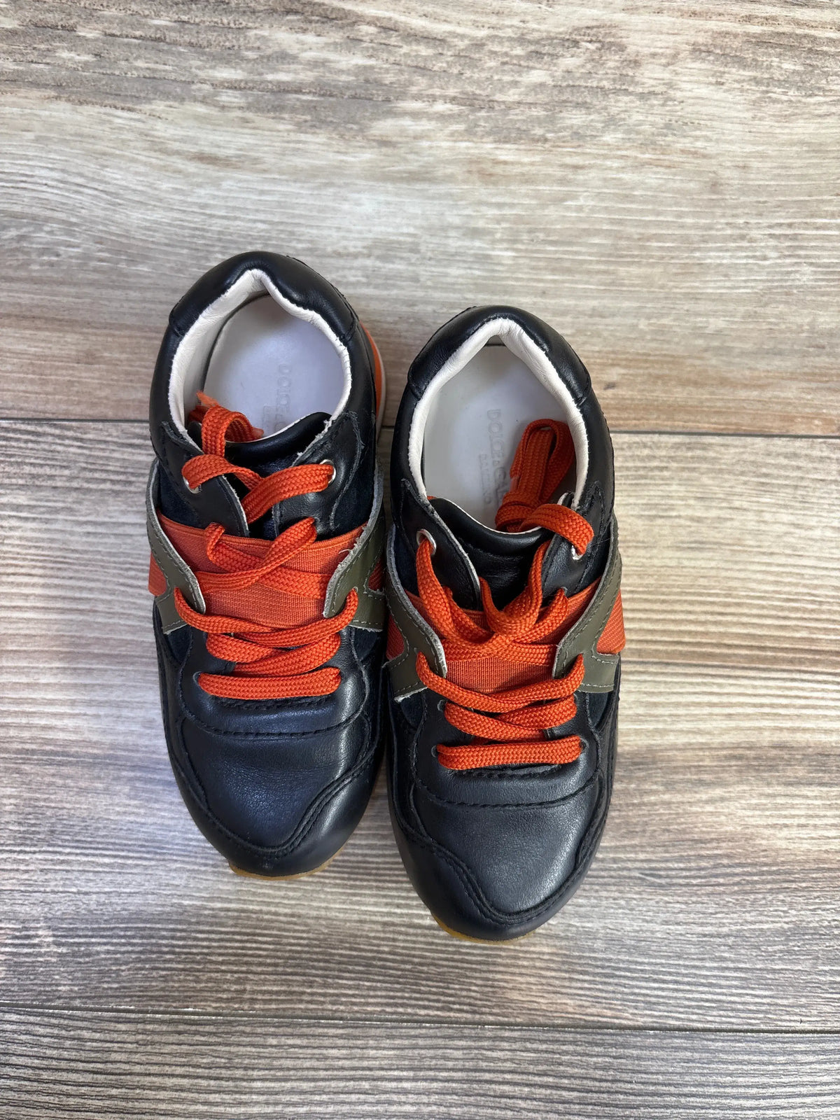 Dolce & Gabbana Bambino black leather sneakers with bright orange laces