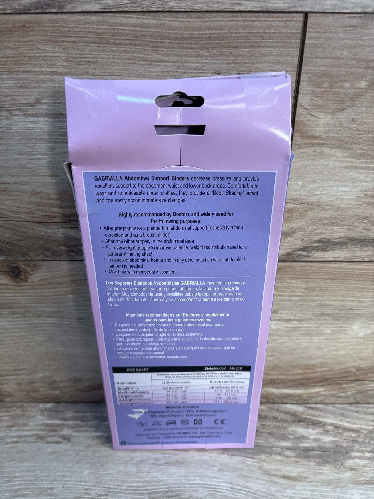 Gabriella abdominal support binder box with product description and size chart on wood floor.