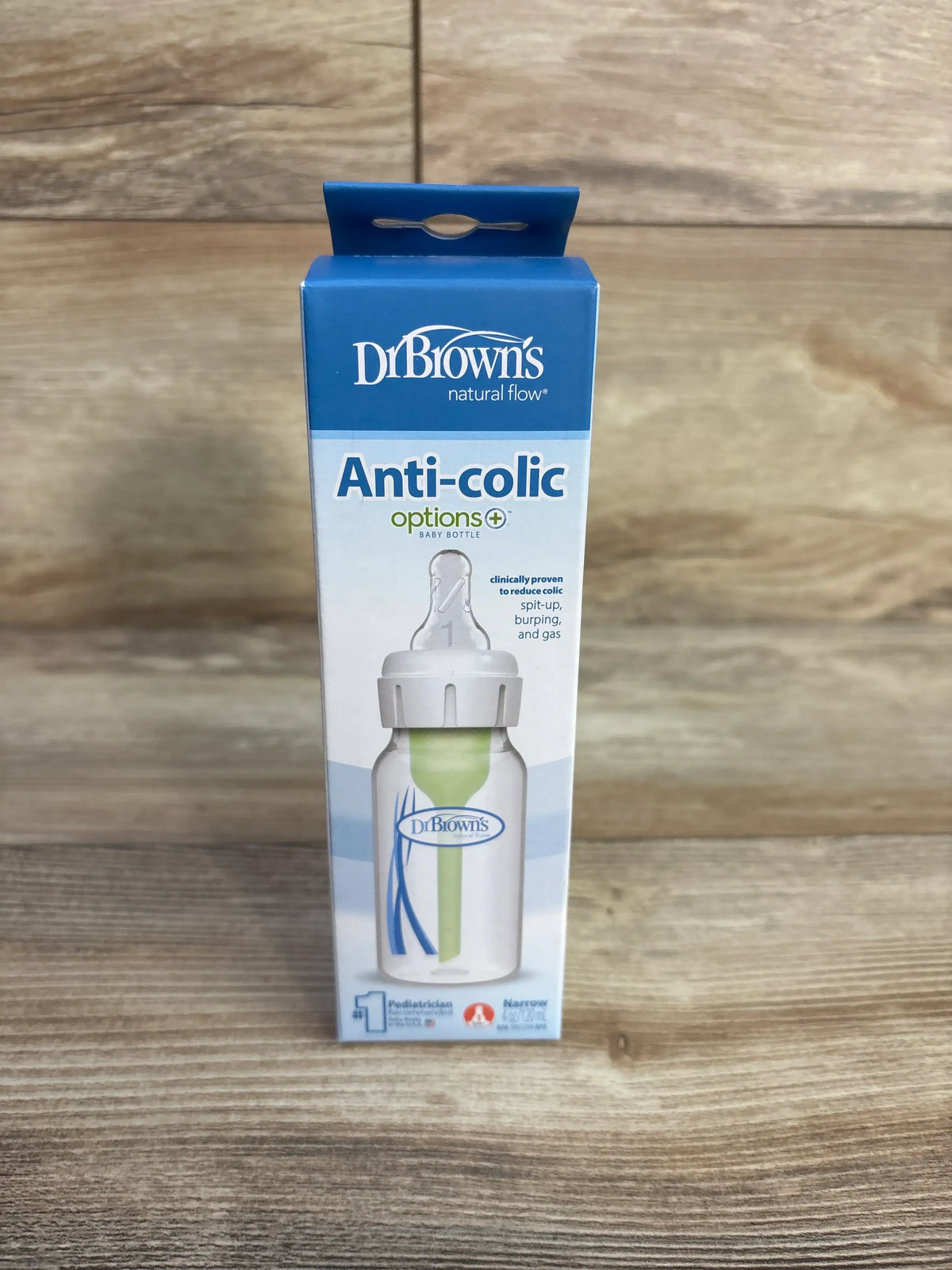 Front view of Dr. Brown’s 4oz Narrow Baby Bottle showcasing anti-colic vent system and Level 1 nipple in boxed packaging