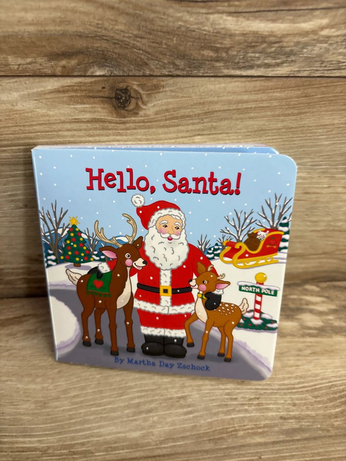 Hello, Santa! children's book with Santa, reindeer, and North Pole scene for holiday gifting