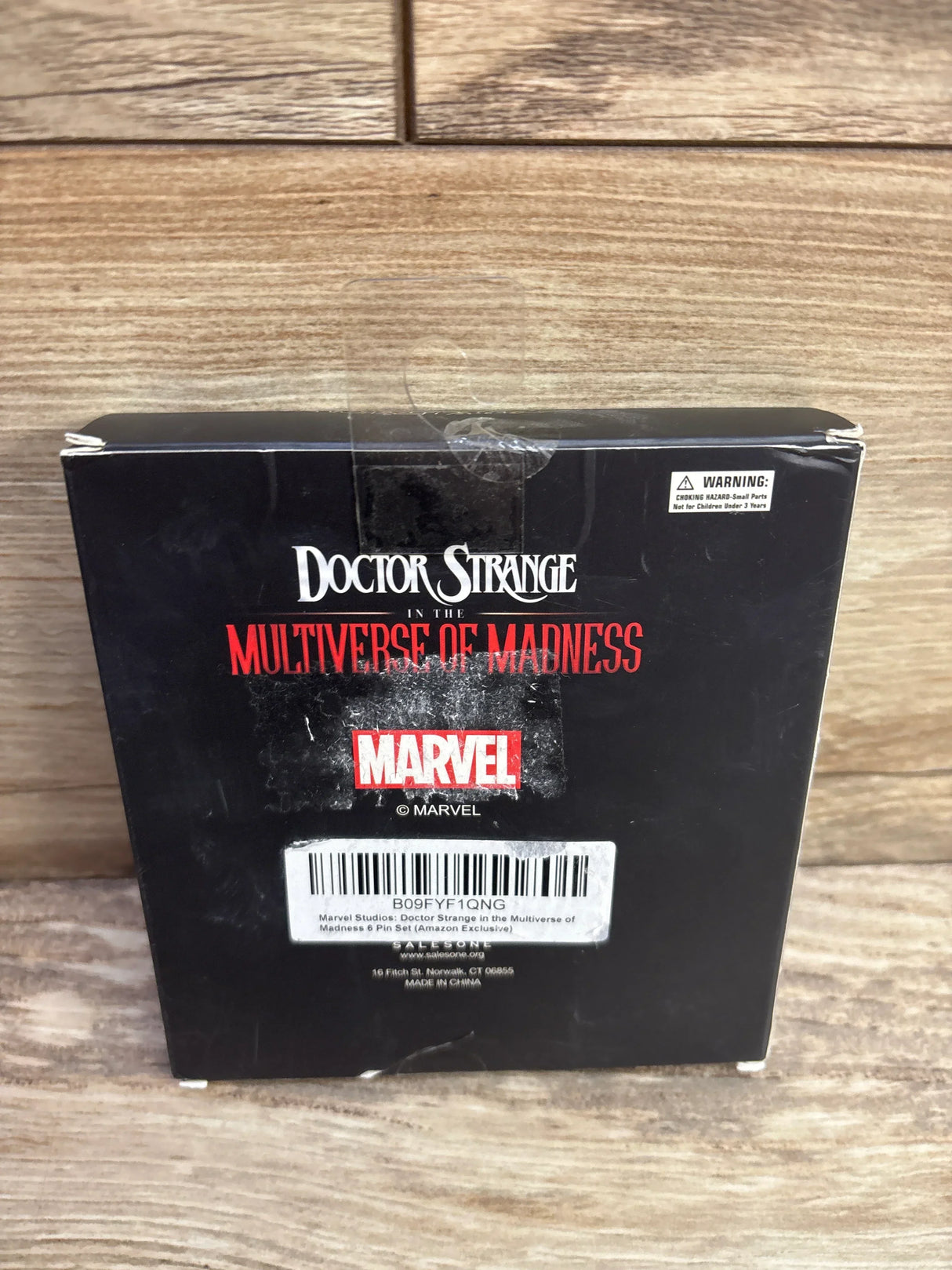 Doctor Strange in the Multiverse of Madness Marvel collectible box on wood background