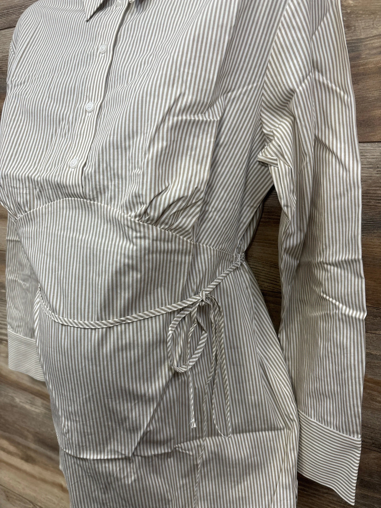 Gray and white striped maternity blouse with tie waist and long sleeves