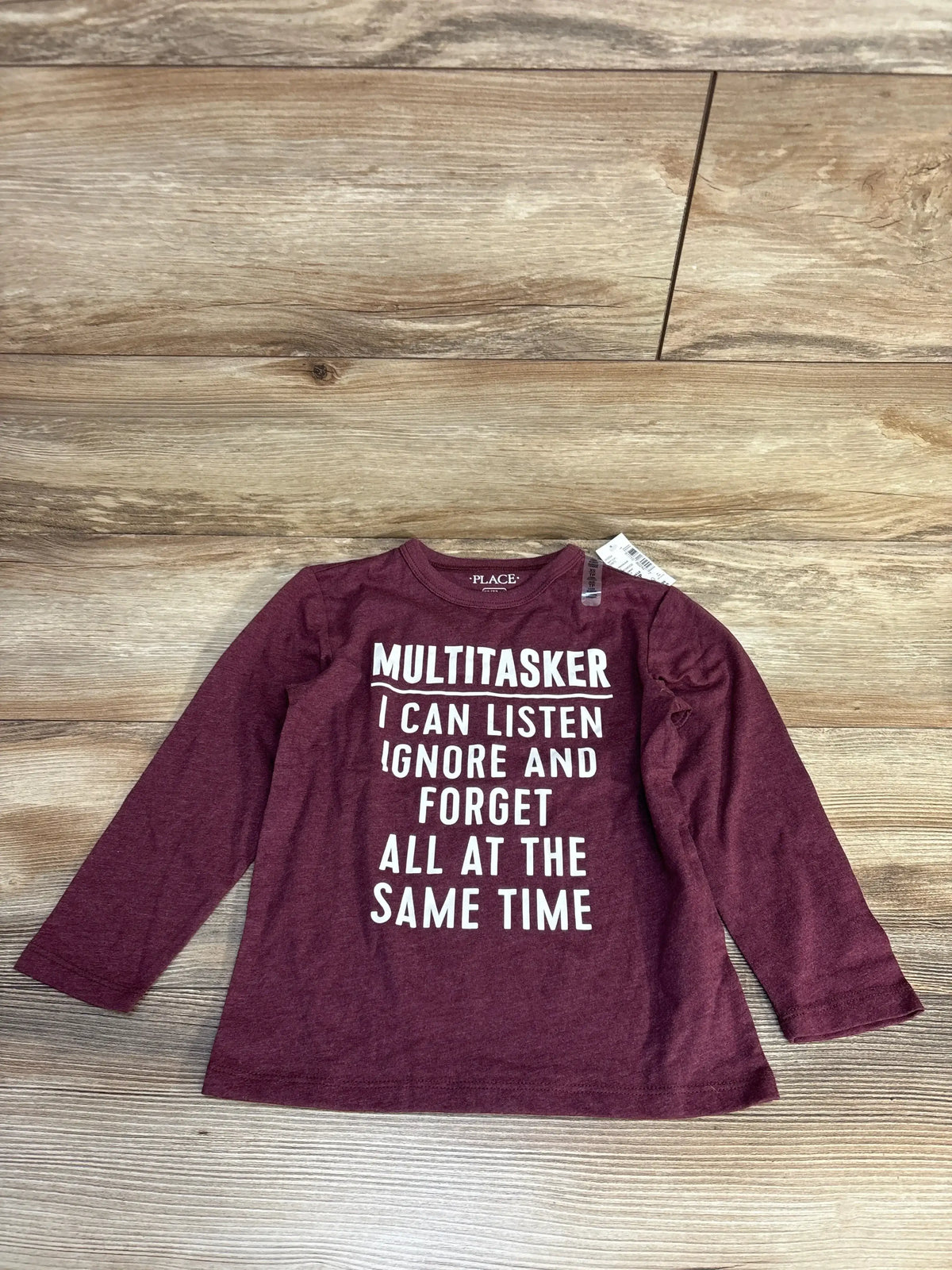 Maroon long sleeve kids shirt with 'Multitasker I can listen ignore and forget all at the same time' text