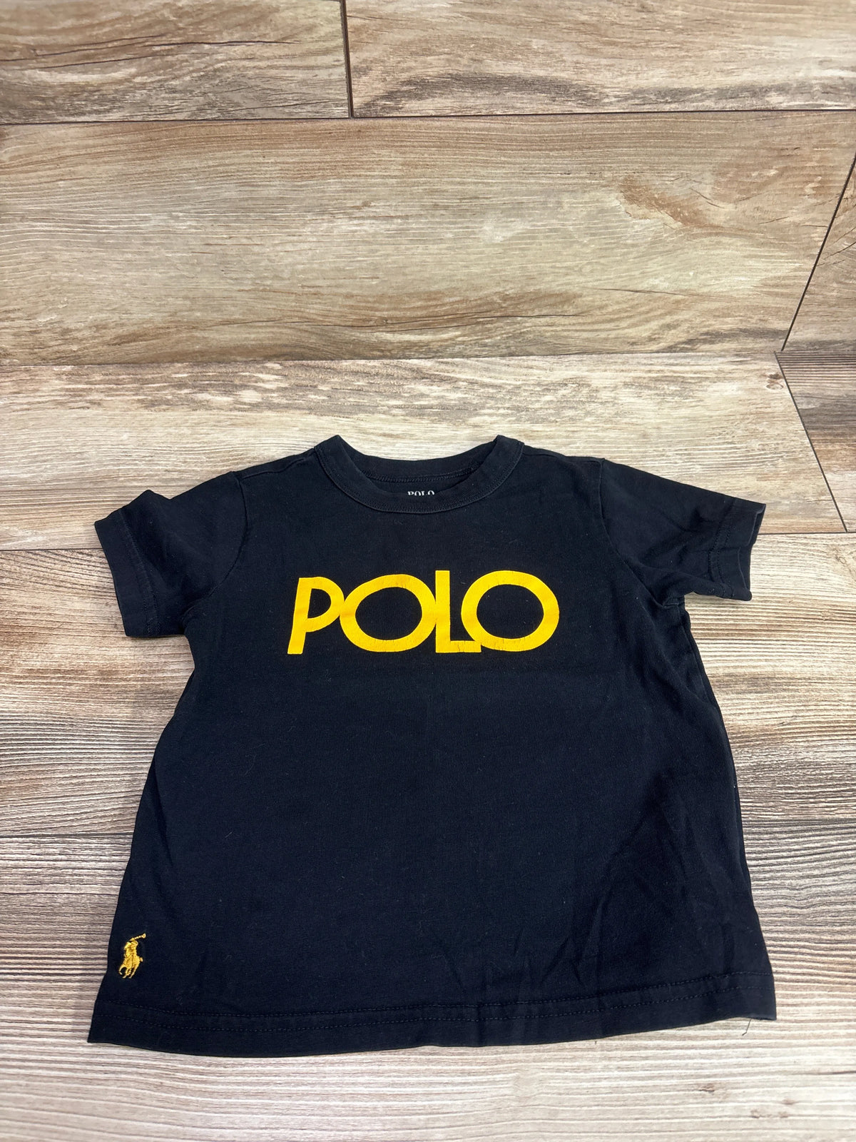 Black toddler t-shirt by Me n Mommy To Be featuring a yellow POLO logo and small emblem.