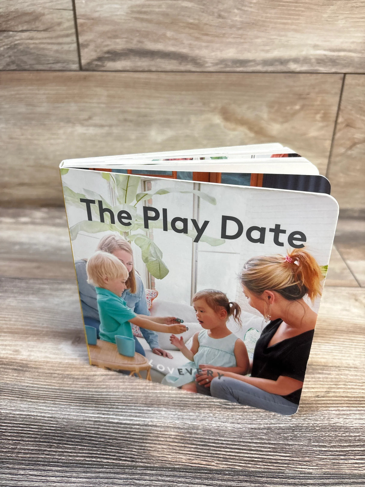 The Play Date children's board book with moms and kids playing, perfect for toddler playtime and early learning.
