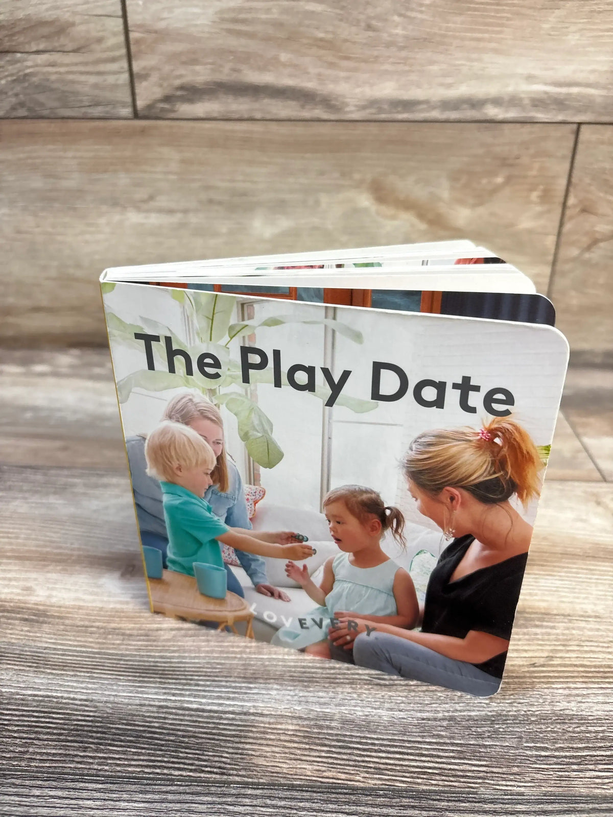 The Play Date children's board book with moms and kids playing, perfect for toddler playtime and early learning.