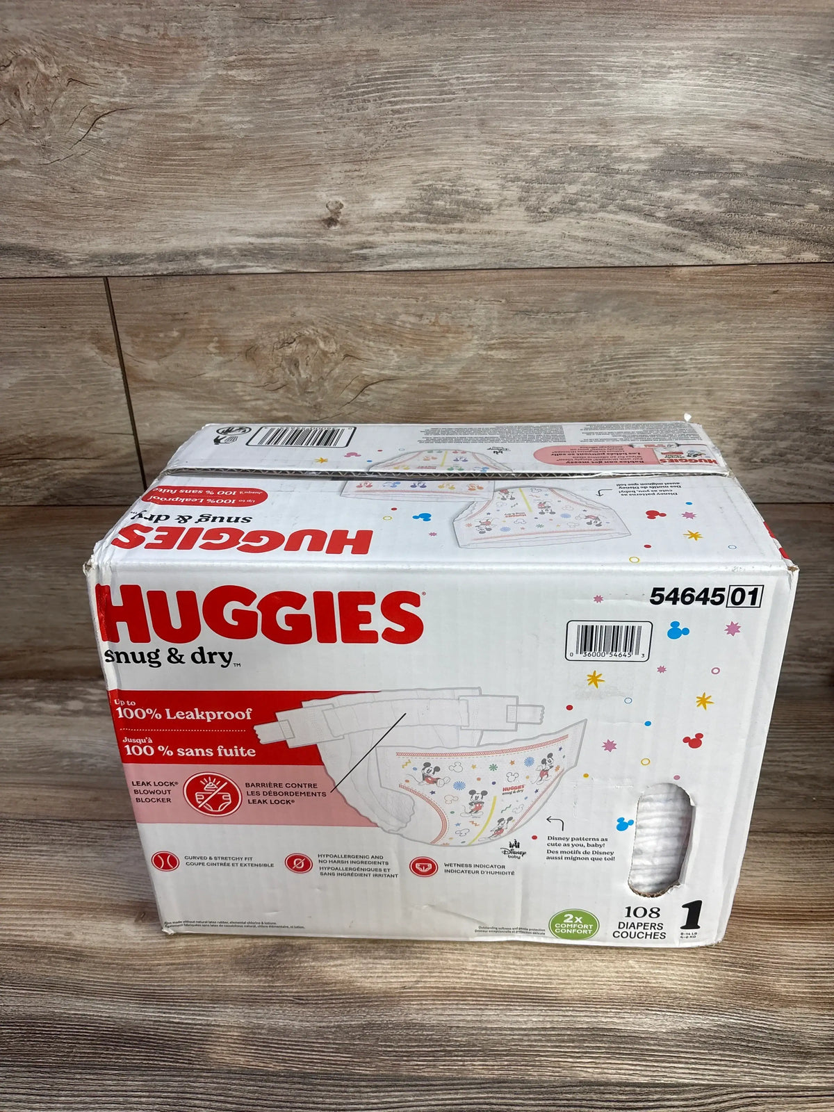 Front view of Huggies Snug & Dry size 1 diaper pack (108 ct) showing package design and brand logo on white background