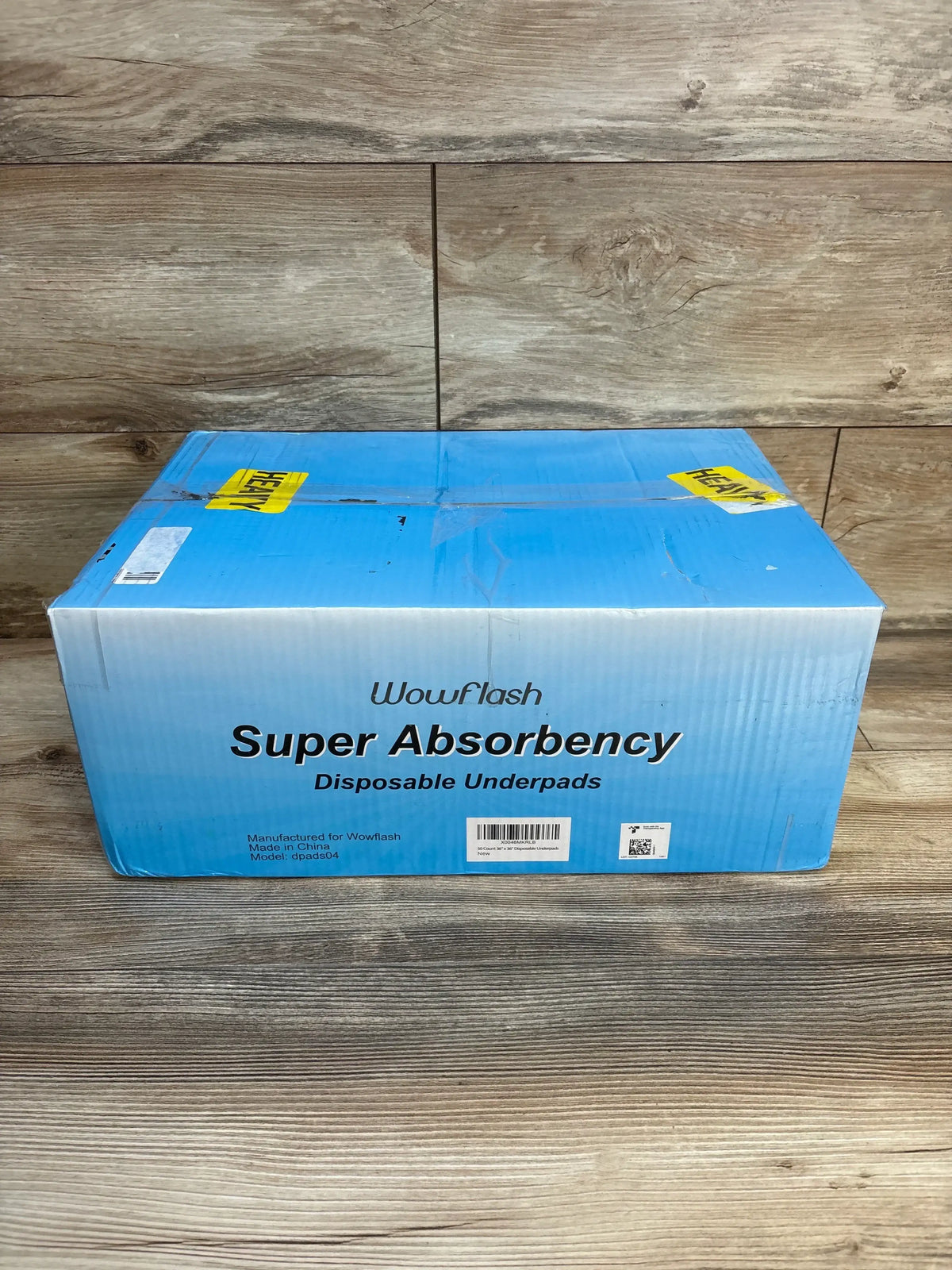 Front view of Wowflash Super Absorbency disposable underpads pack showcasing Super Absorbency label and 50-count packaging on white background