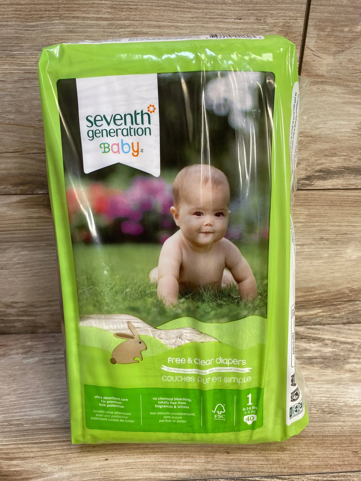 Front view of Seventh Generation diaper pack (size 1, 40 count) showcasing Free & Clear label and baby photo on green background