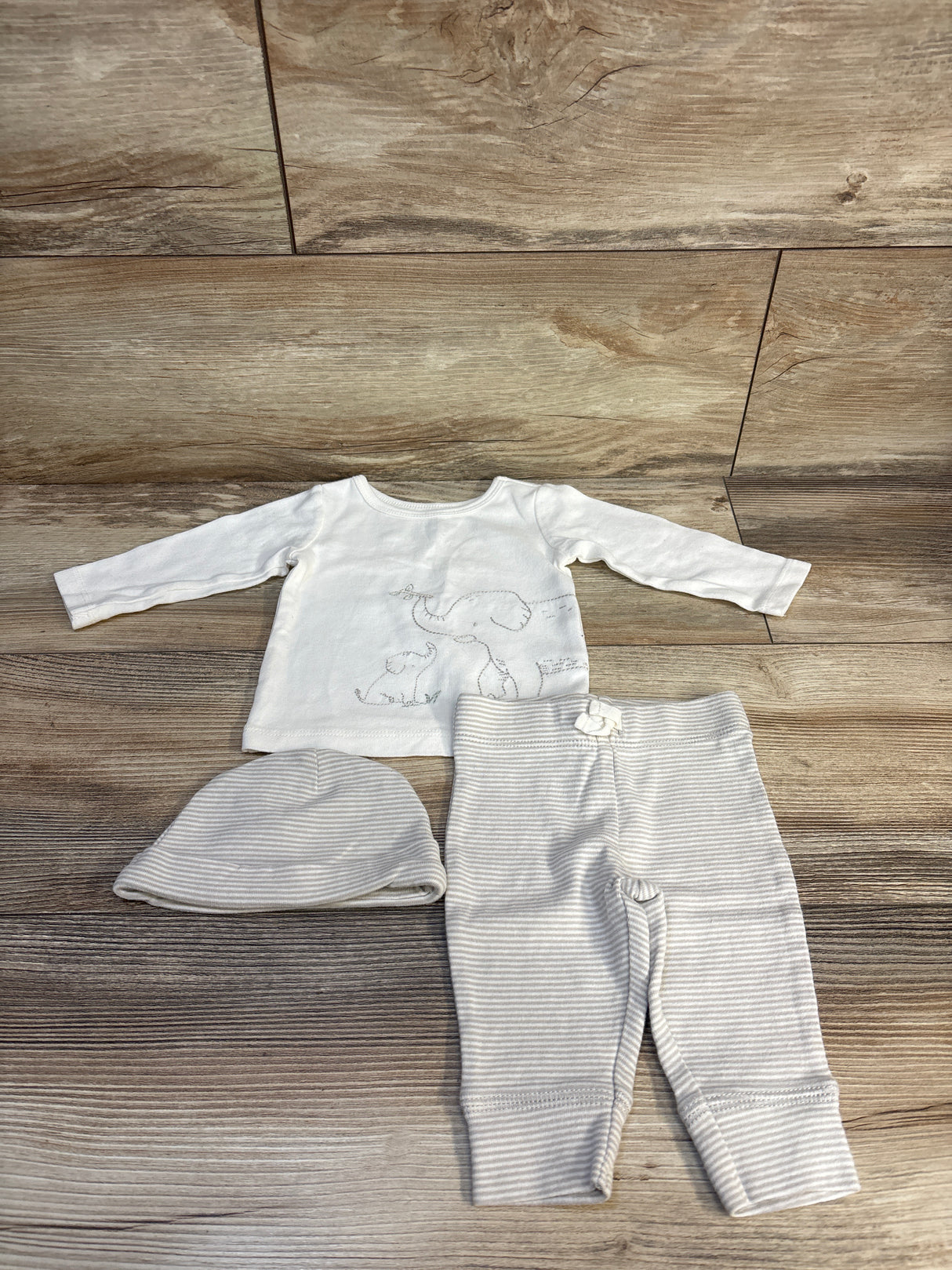 Baby outfit with elephant print top, striped pants & hat, ideal for newborns and infants