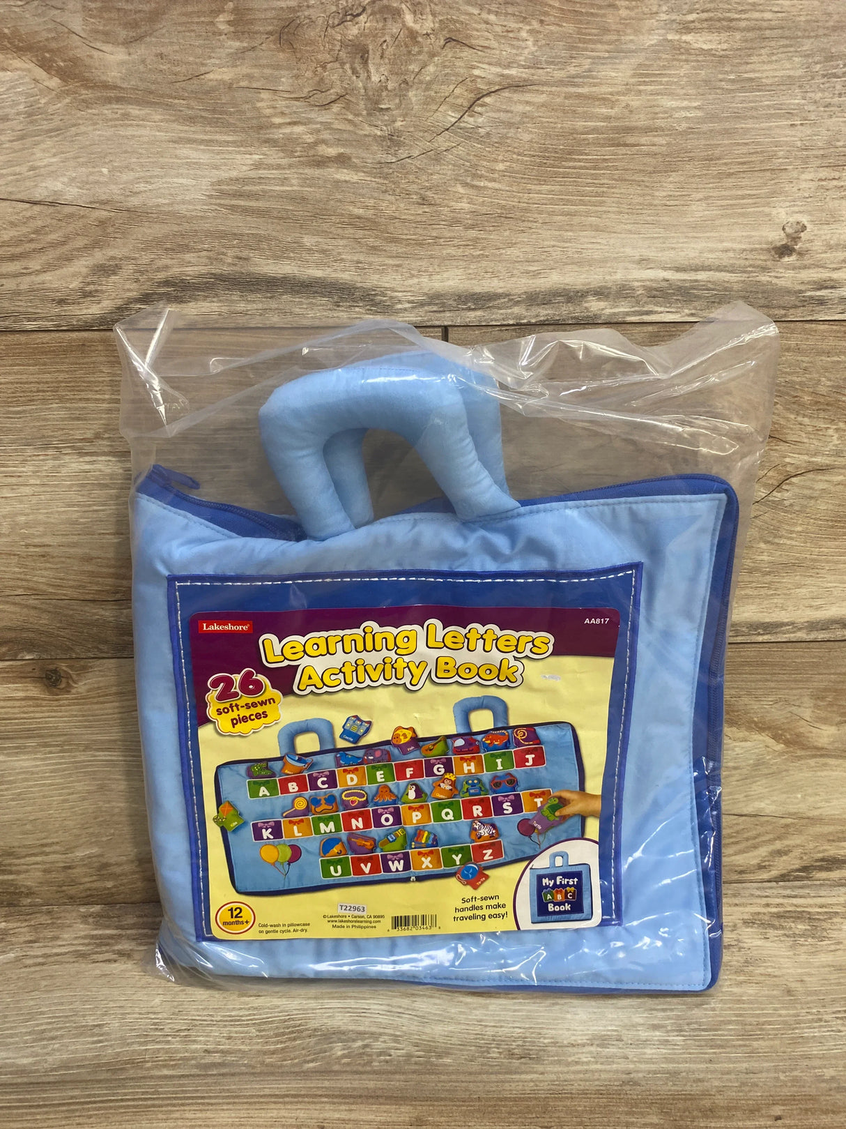 Lakeshore Learning Letters Activity Book with 26 soft-sewn alphabet pieces in blue carrying case
