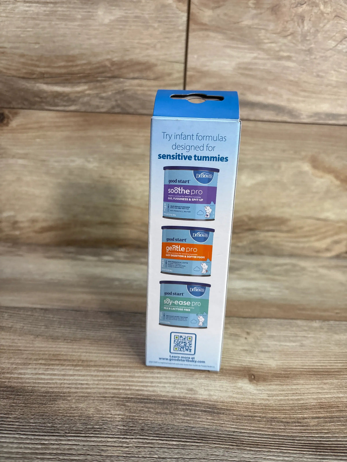 Side view of Dr. Brown’s Narrow Baby Bottle packaging showing sensitive-tummy formula graphics