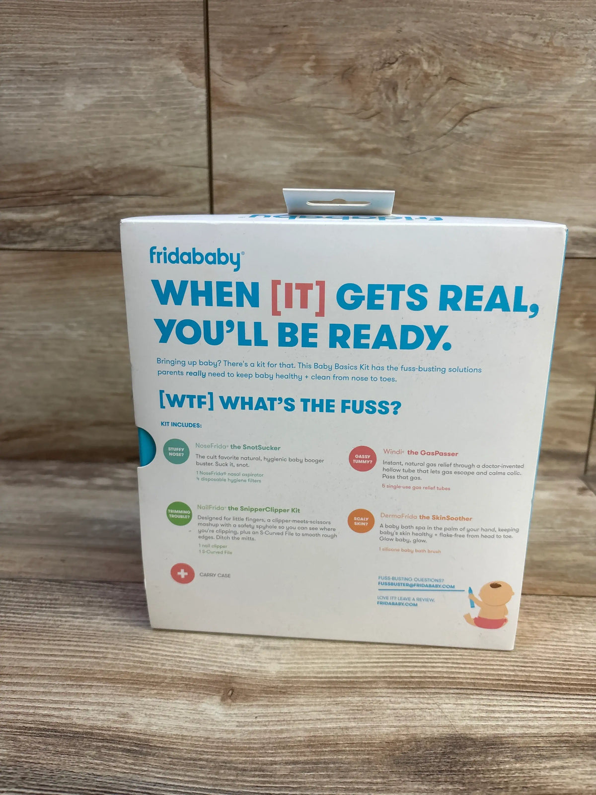 Back view of Frida Baby Basics Kit 14pc package with baby-care tool list and When it gets real, youll be ready text