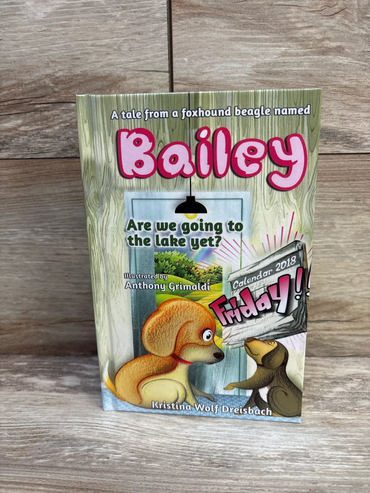 Front view of Bailey hardcover kids book showing illustrated beagle and dog with large title Are we going to the lake yet?