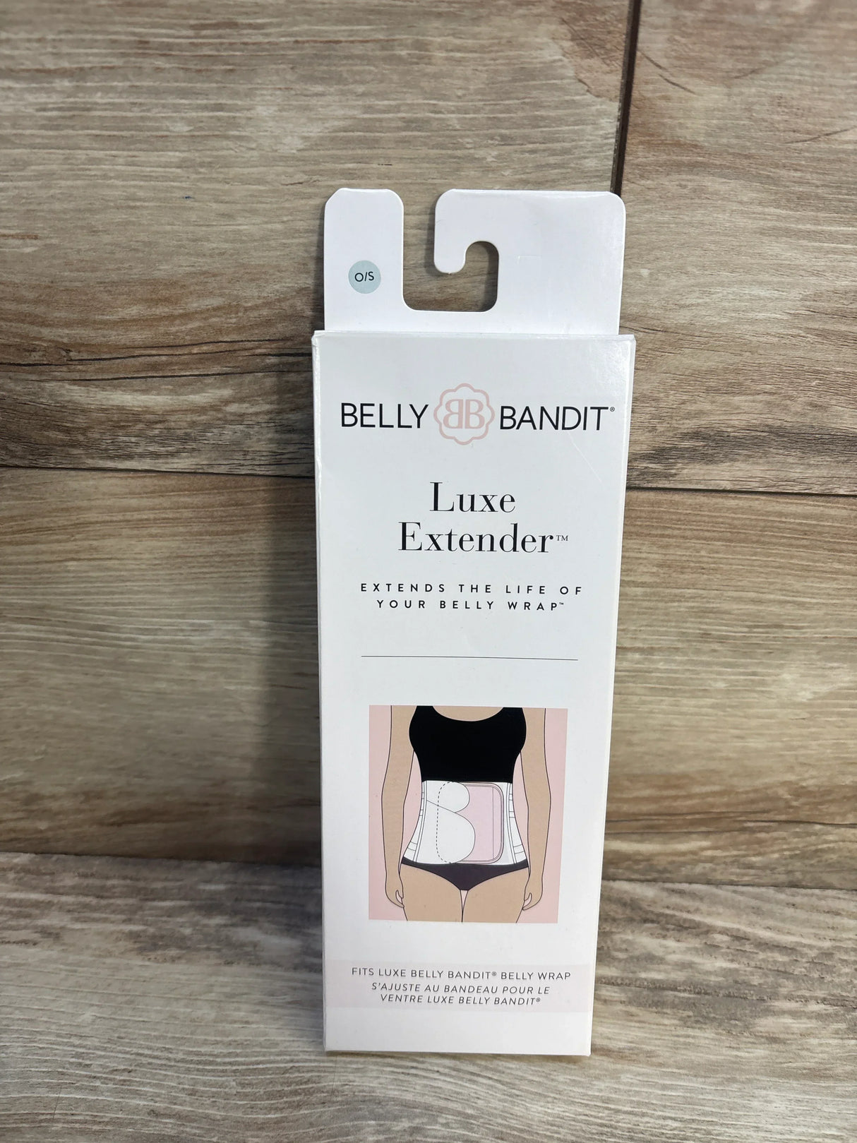 Front of Belly Bandit Luxe Extender box showing tagline extends life of belly wrap and fit illustration on wood