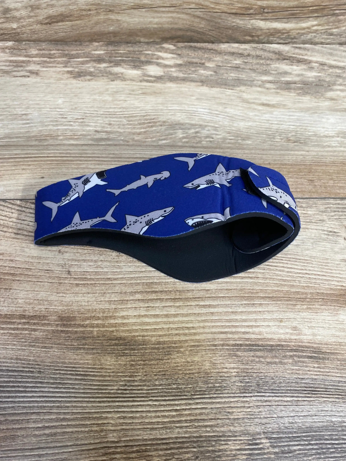 Front view of Ear Band-It Ultra infant swimming headband showcasing ear-protecting band, blue, size 0–18 months on white background