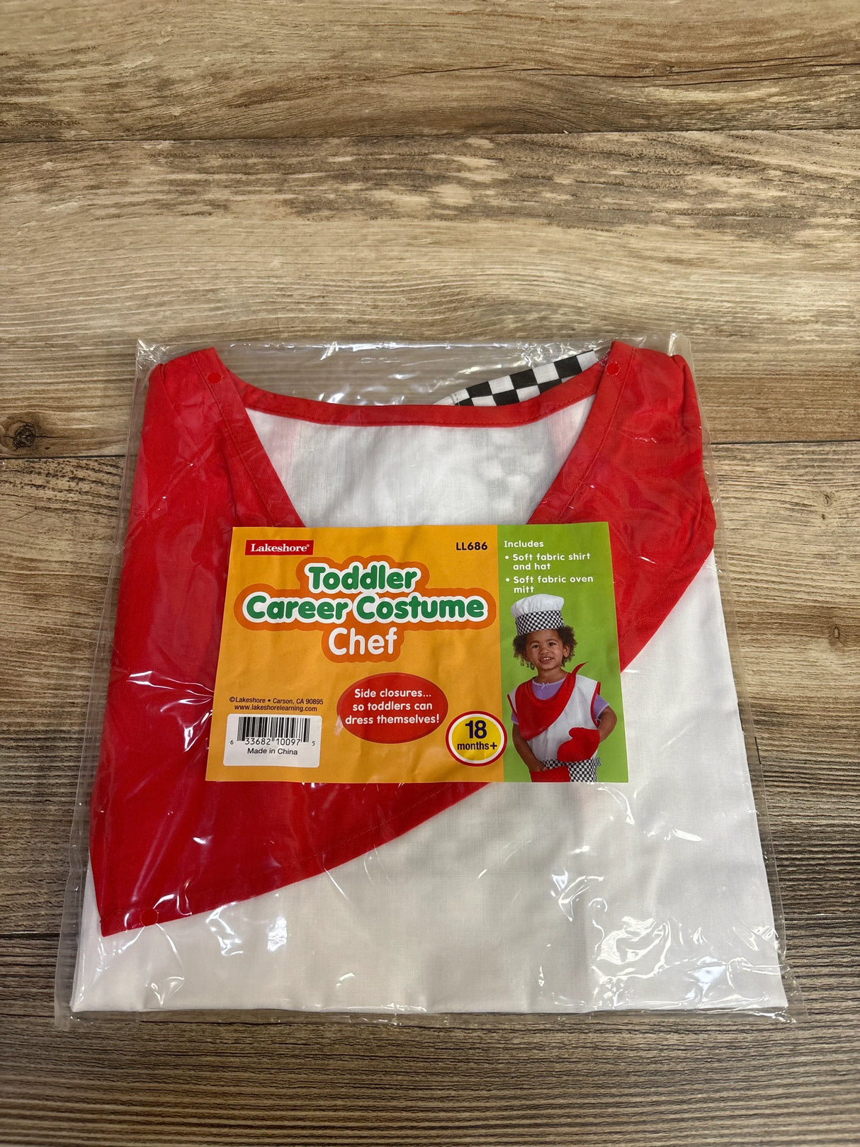 Toddler chef costume with red and white apron, hat, and oven mitt for 18 months+