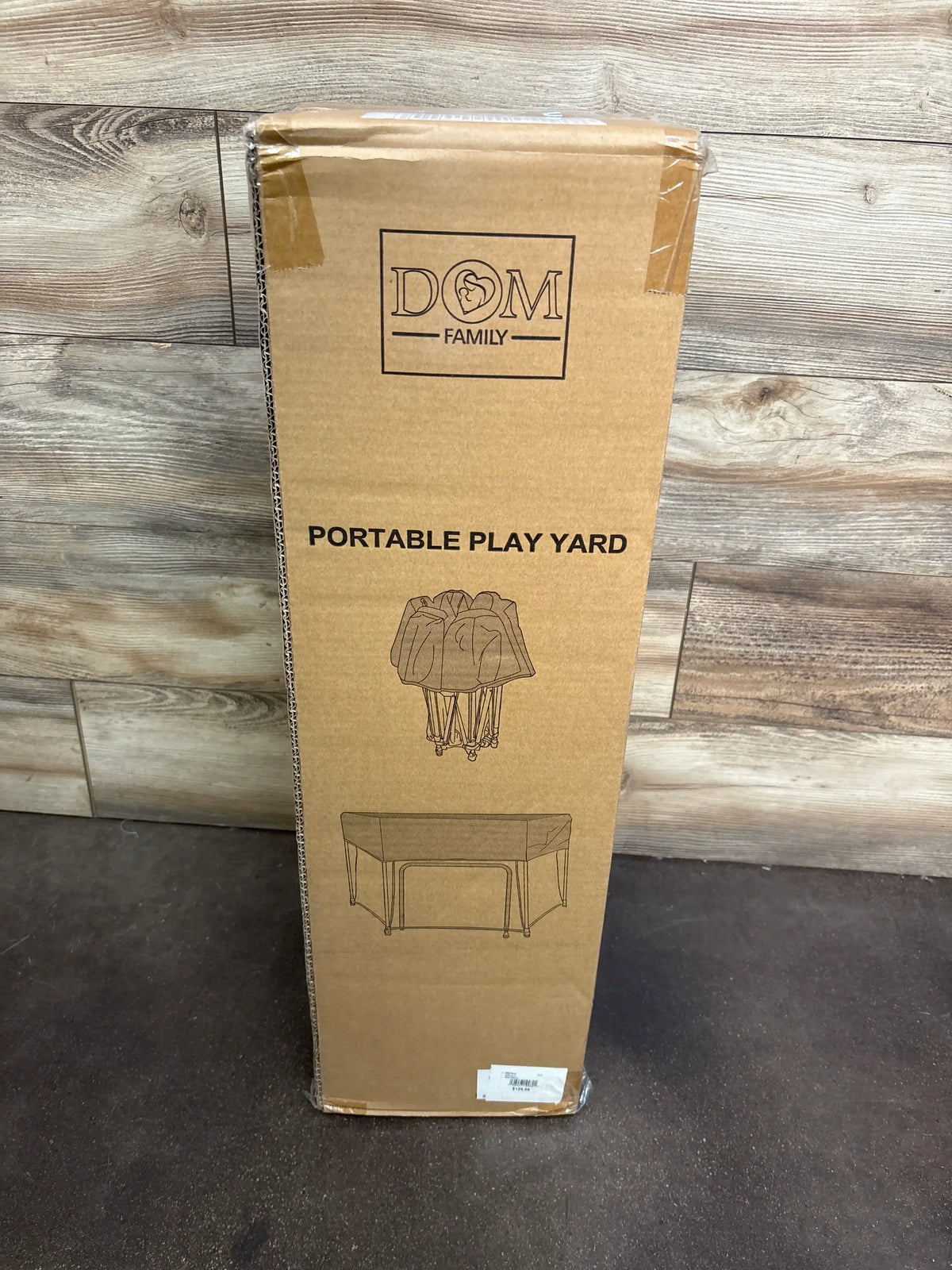 Front view of NEW Dream On Me Onyx 6-Panel Playpen in Black showcasing its portable play yard design on packaging