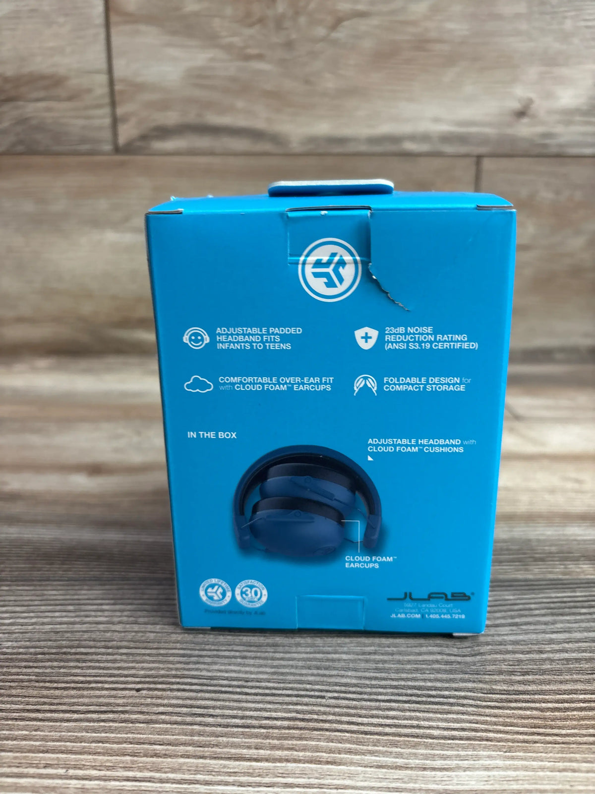 Rear view of navy JLab JBuddies Protect earmuffs package showcasing adjustable padded headband and cloud foam earcups