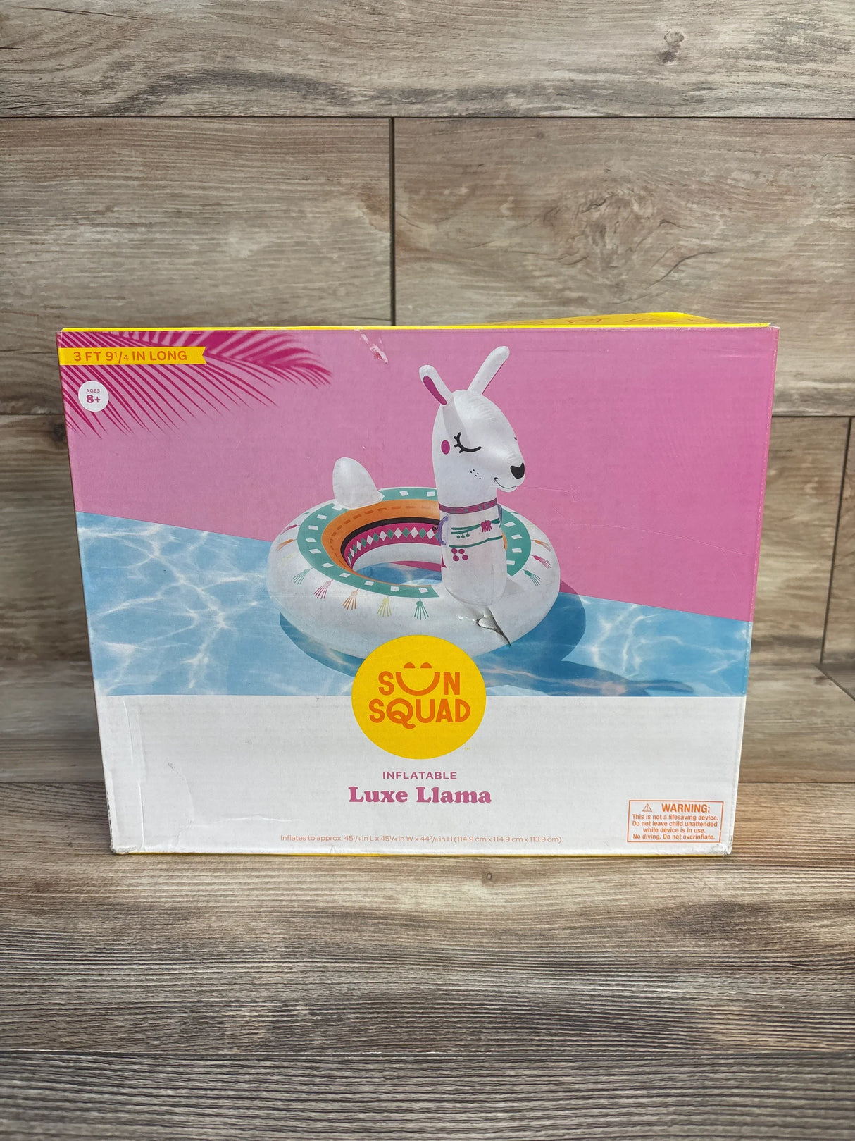 Sun Squad inflatable Luxe Llama pool float for kids, colorful llama tube in packaging