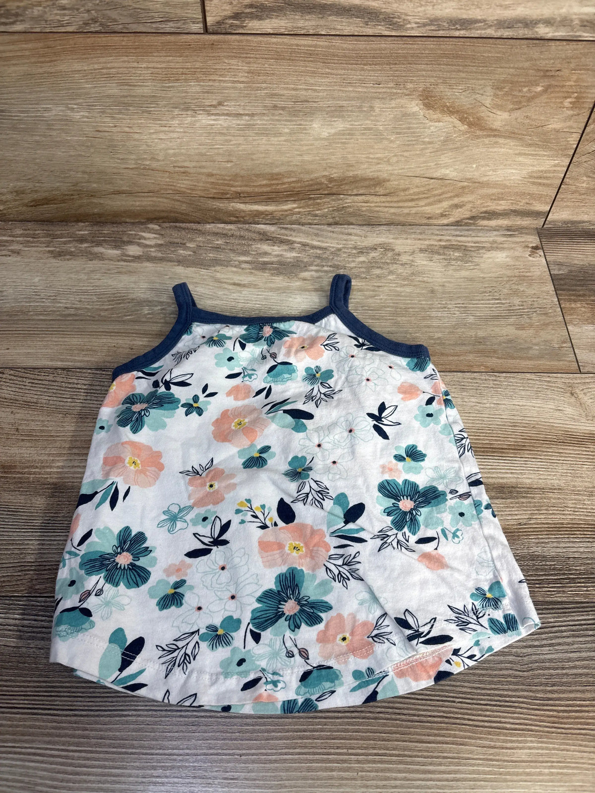 Honest Baby white floral tank top for toddlers with blue and peach flowers