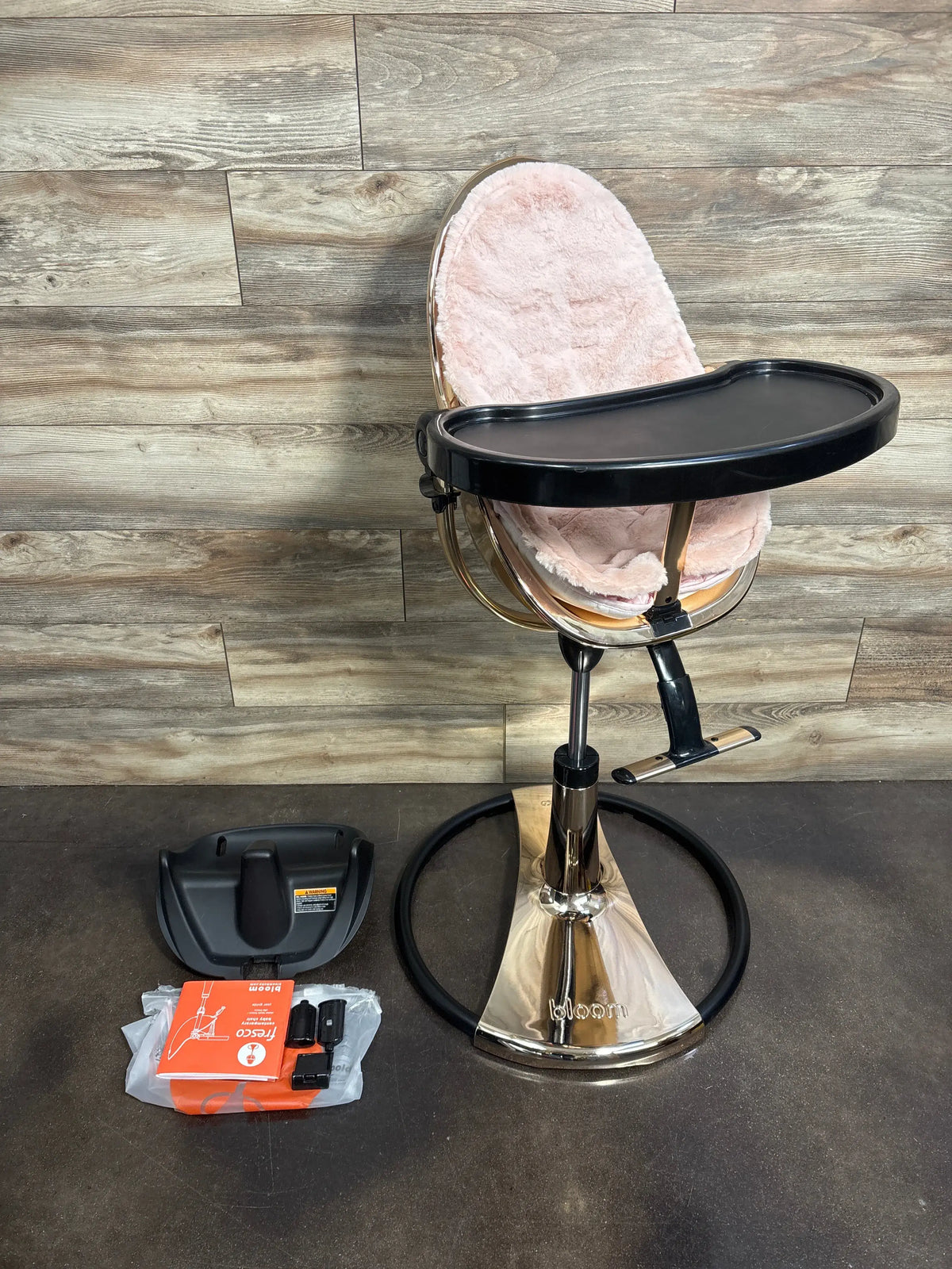 Front view of Bloom Fresco Special Edition high chair in Rose Gold with pink infant insert and black tray