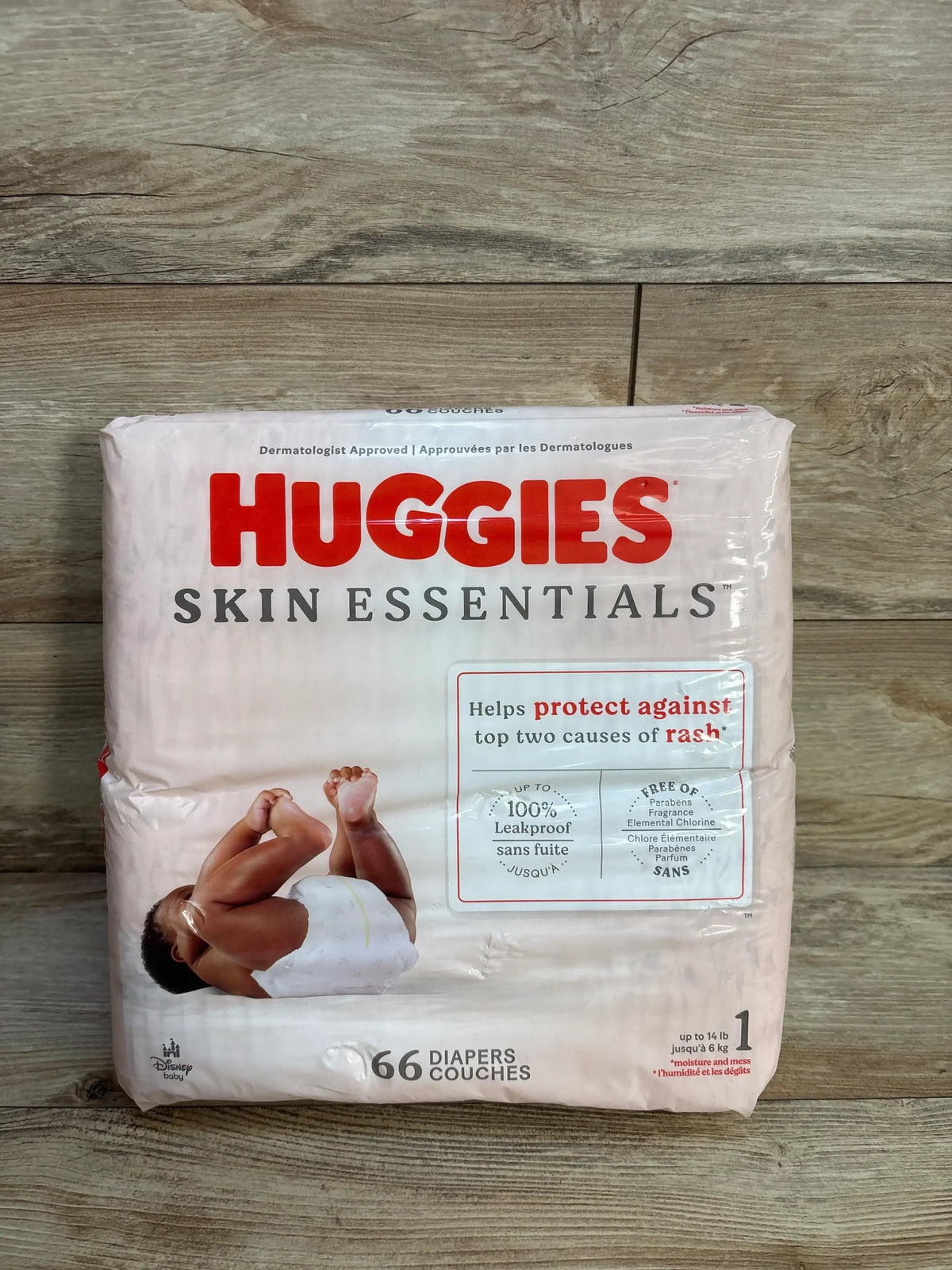 Front of Huggies Skin Essentials diapers size 1, 66-count, showing baby image and ‘protects against rash’ claim