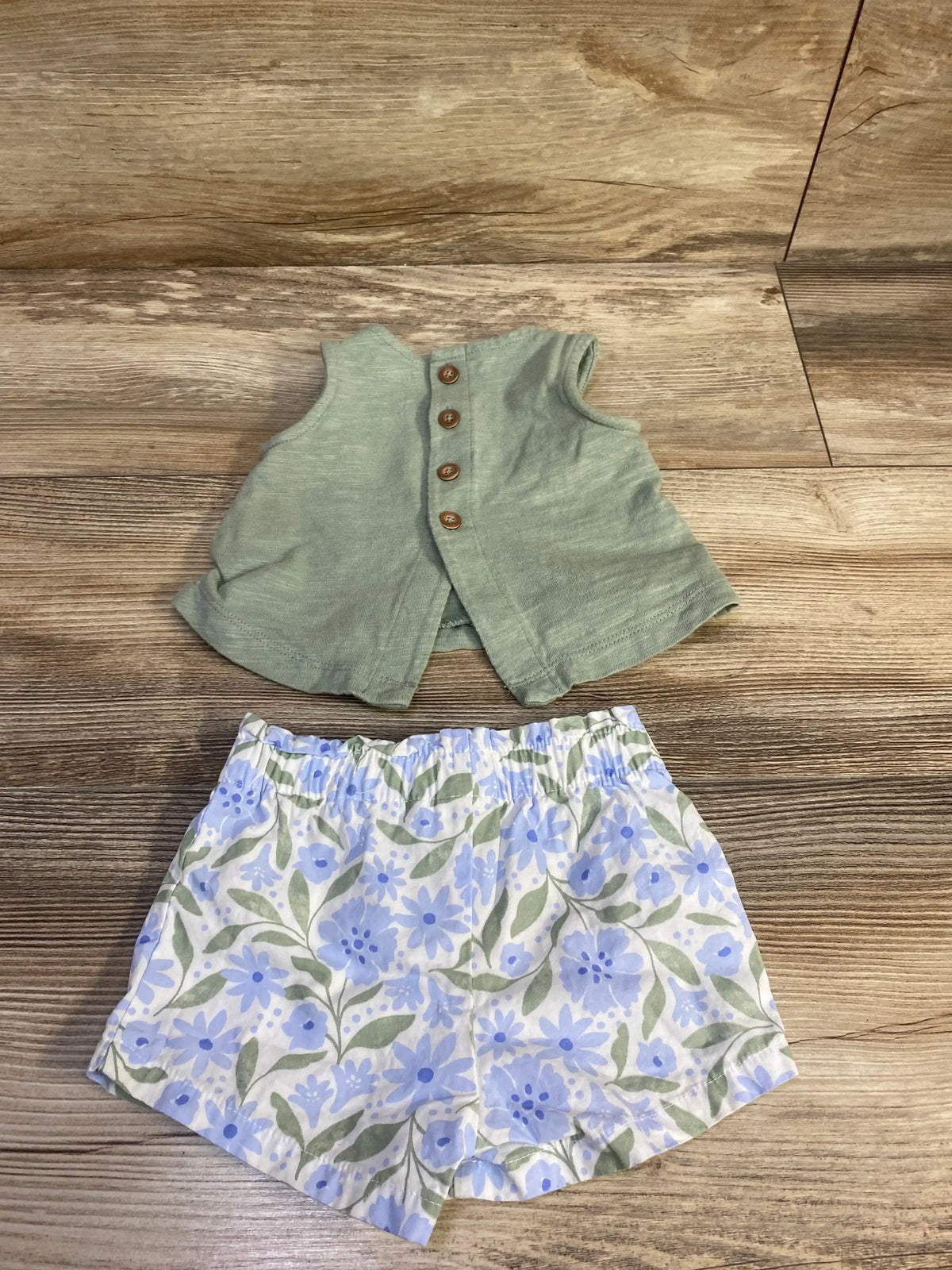 Front view of Just One You green 2-piece tank top and shorts set for baby girls, size 3 months, on white background